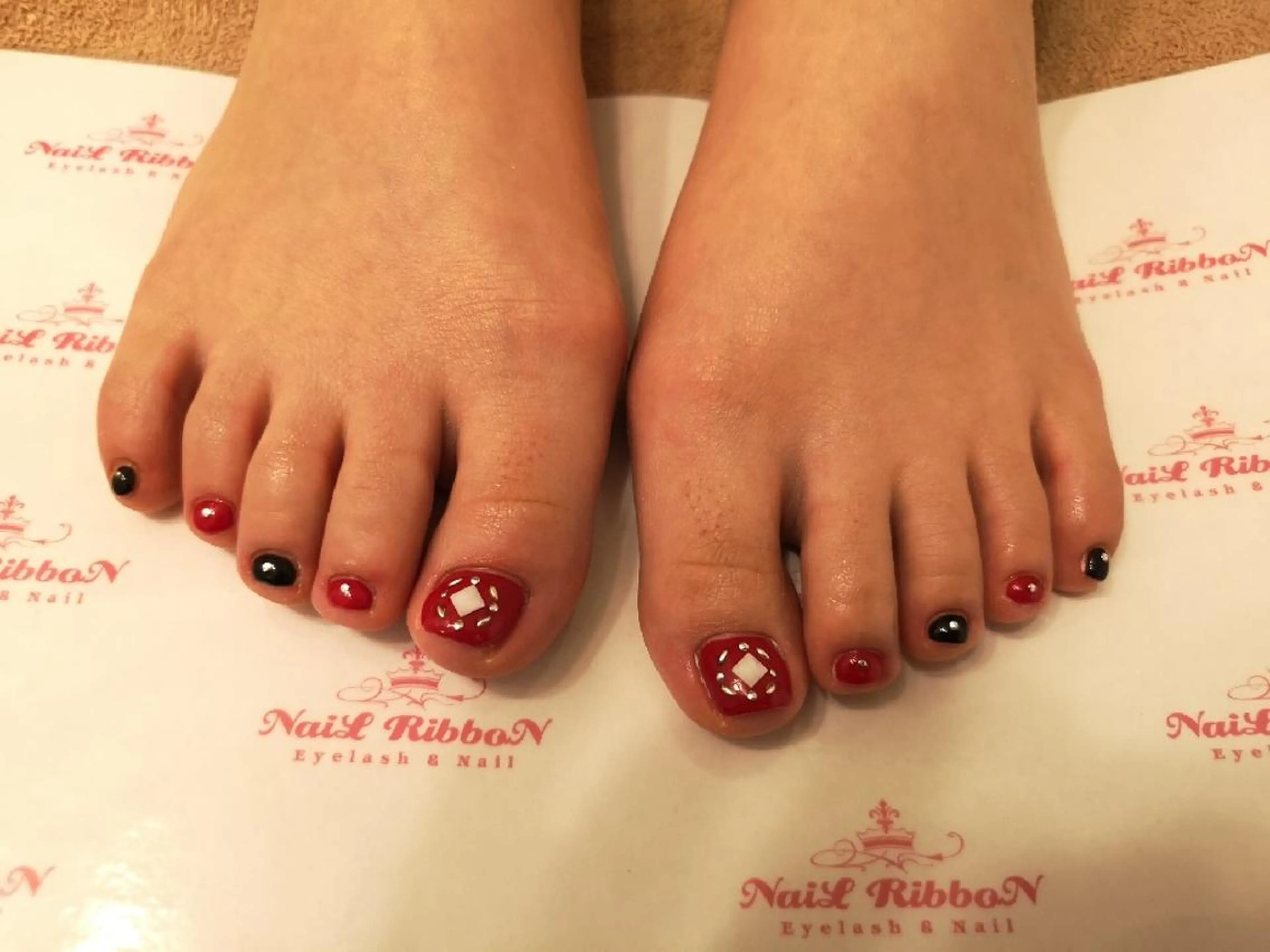 ネイル ネイルリボン 受付スタッフのネイルデザイン