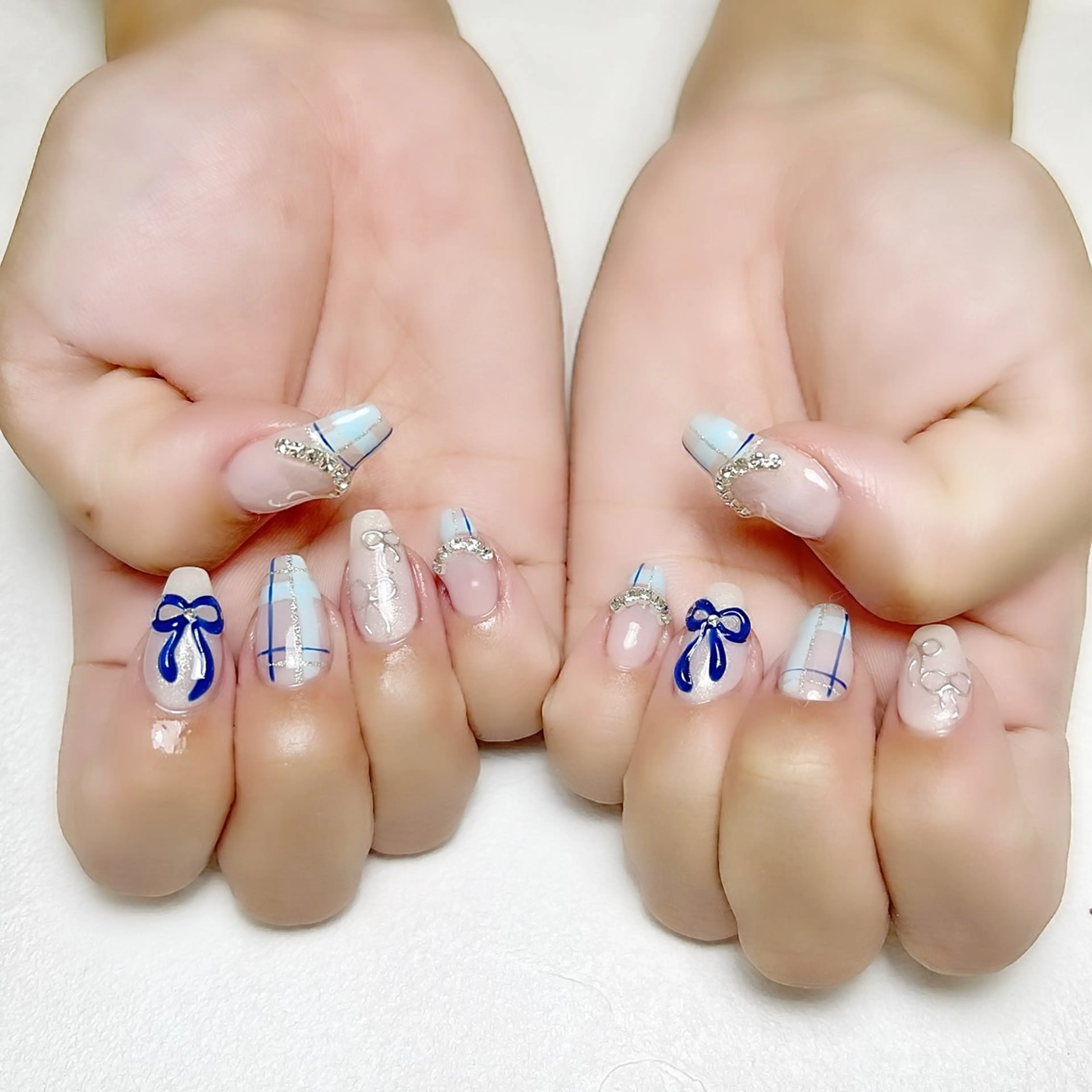 ネイル ブルー ミラーネイル ぷっくりネイル リボン rouse nail RISATOのネイルデザイン
