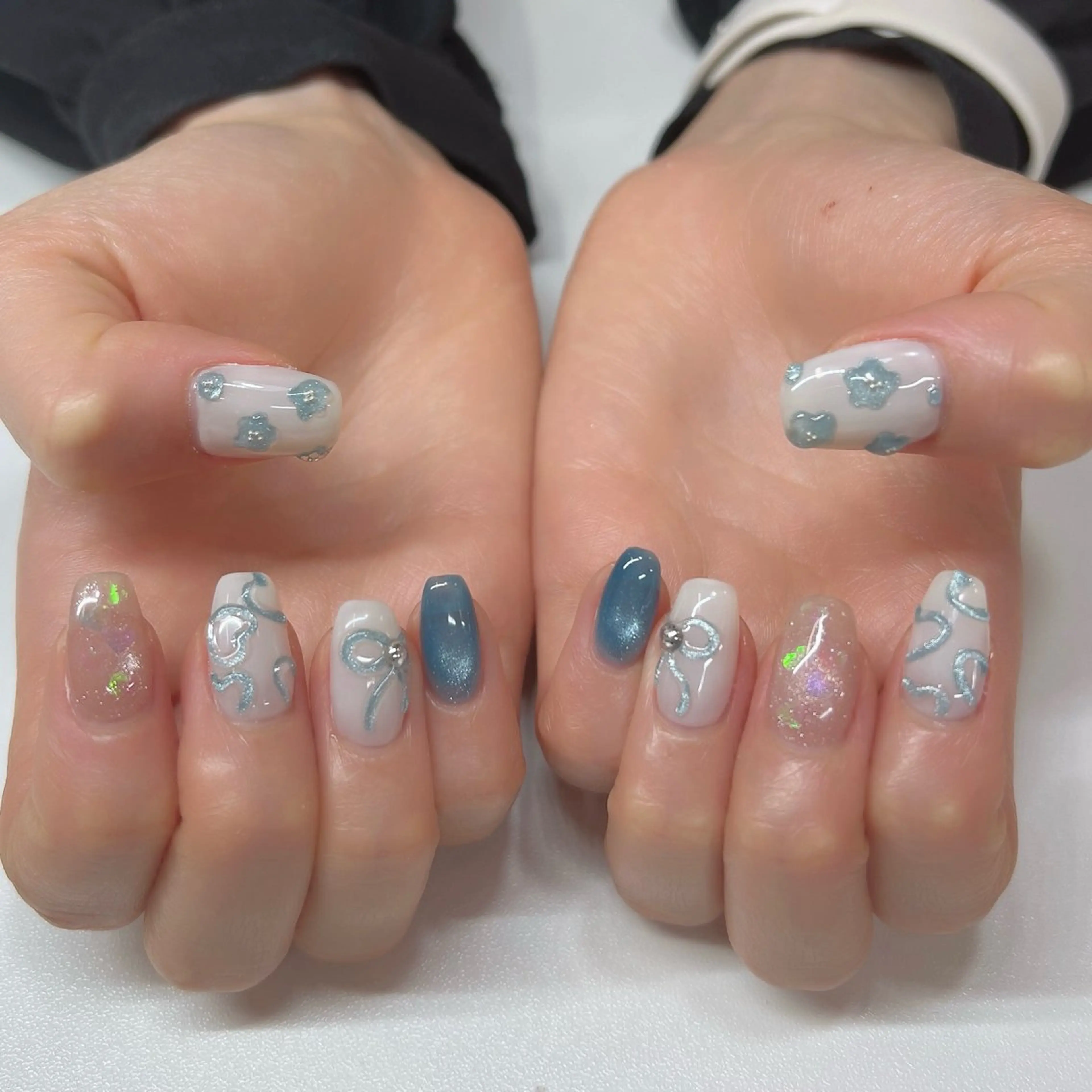 ネイル 水色 ぷっくりネイル ハンドネイル Chipi Neneのネイルデザイン