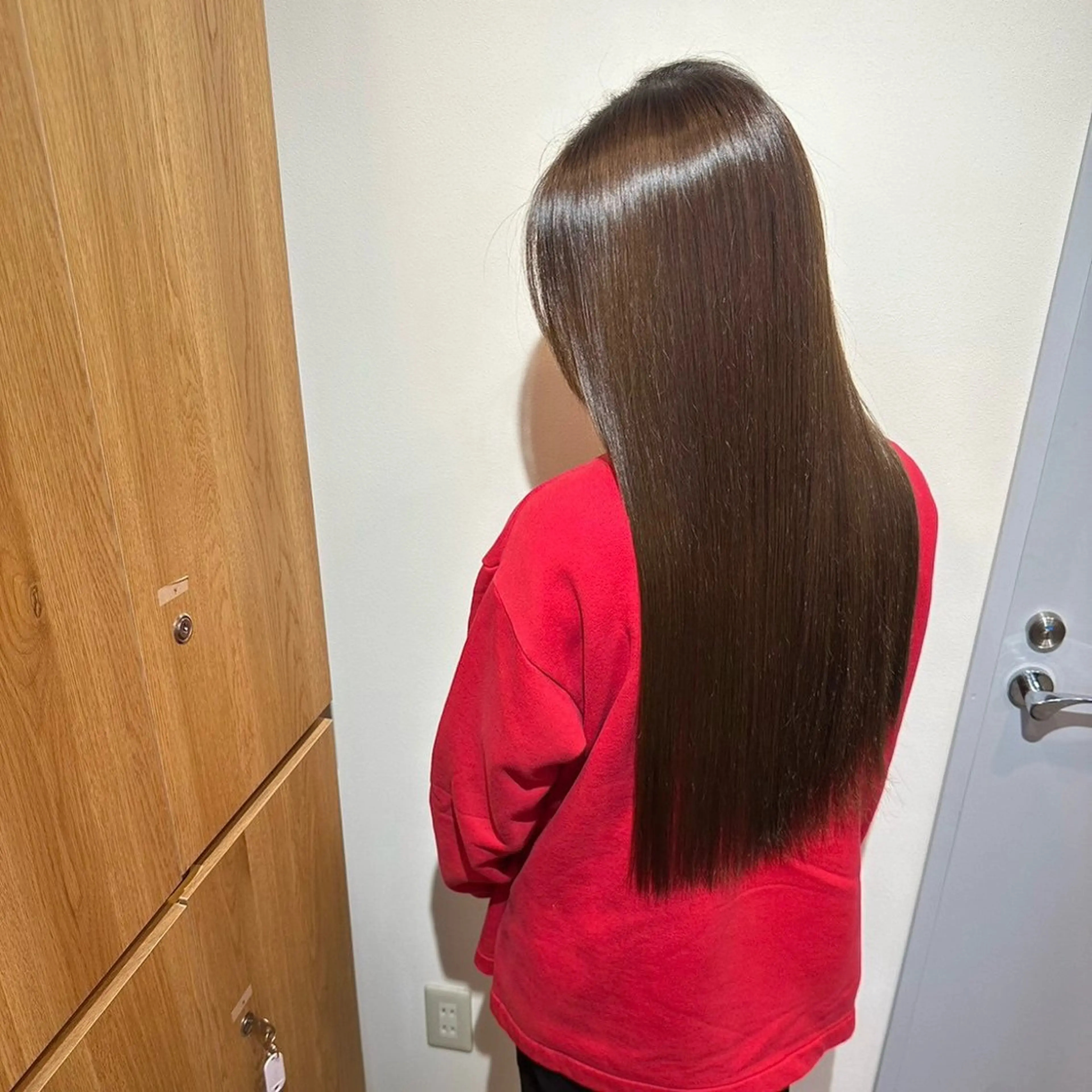 ロング 岡田 佳子のヘアスタイル