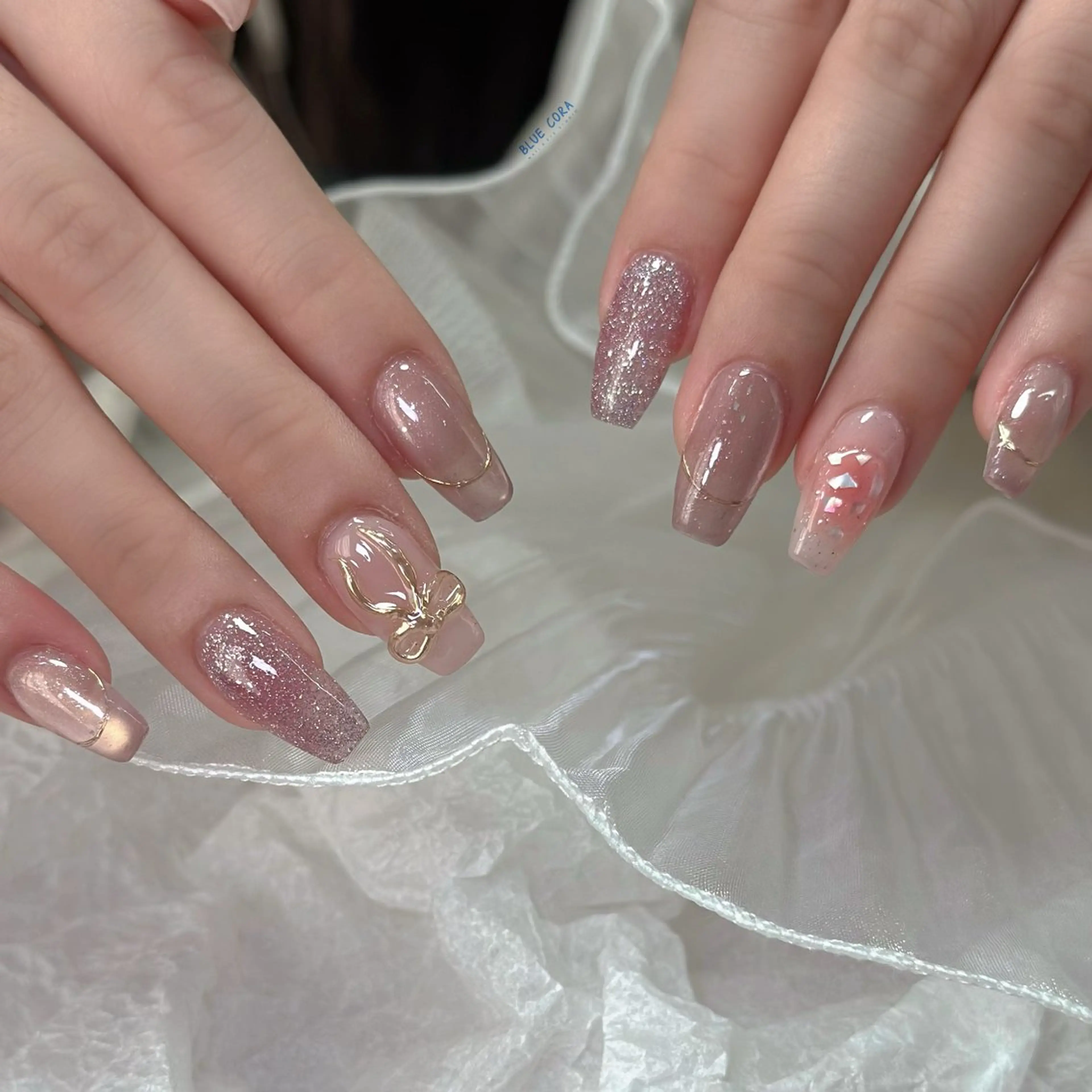 ネイル チークネイル クリアネイル フラッシュネイル ラメ(グリッター) マグネットネイル ハンドネイル ハンドケア BLUE CORAのネイルデザイン