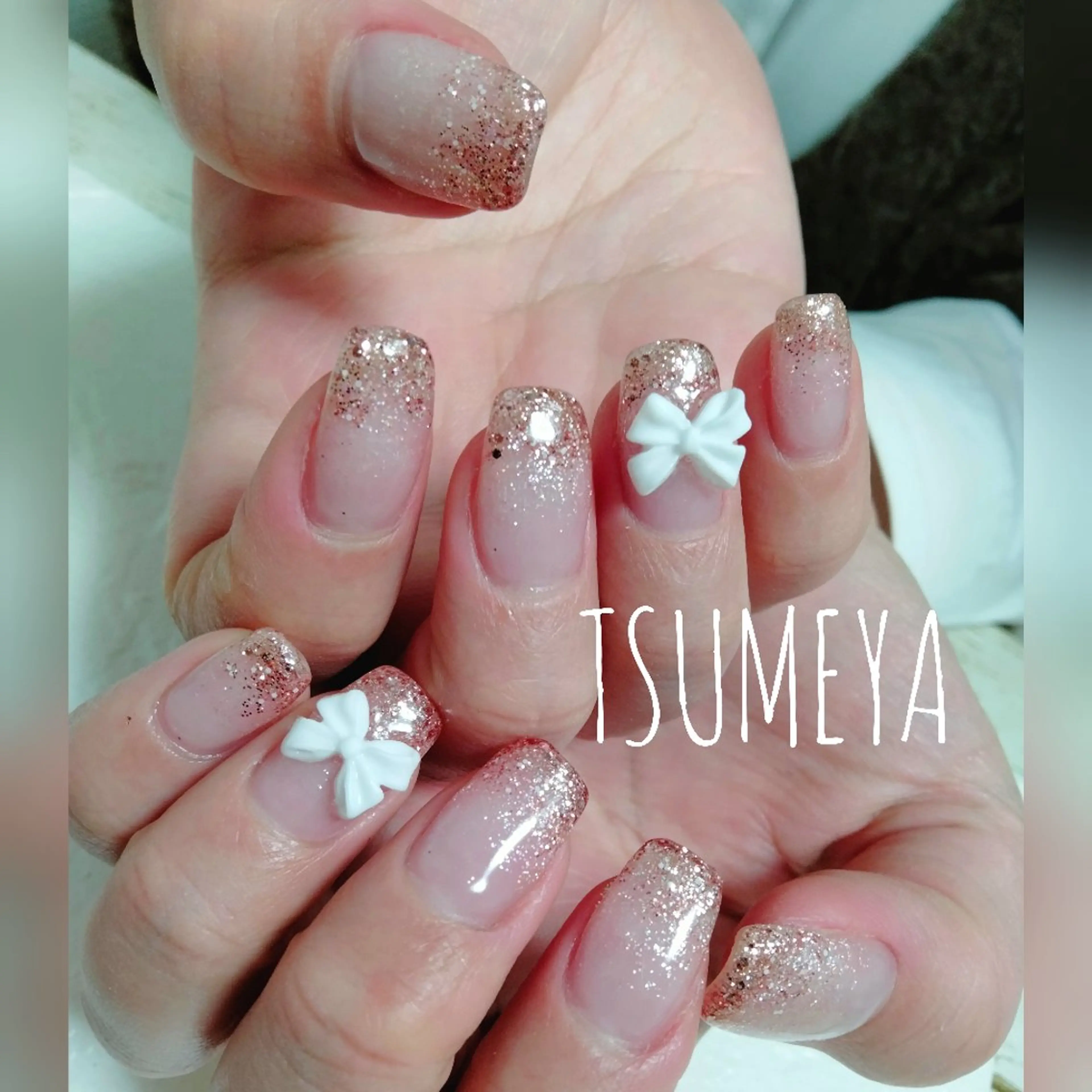 ネイル ゴールド ピンク リボン ハンドネイル _TSUMEYA _のネイルデザイン