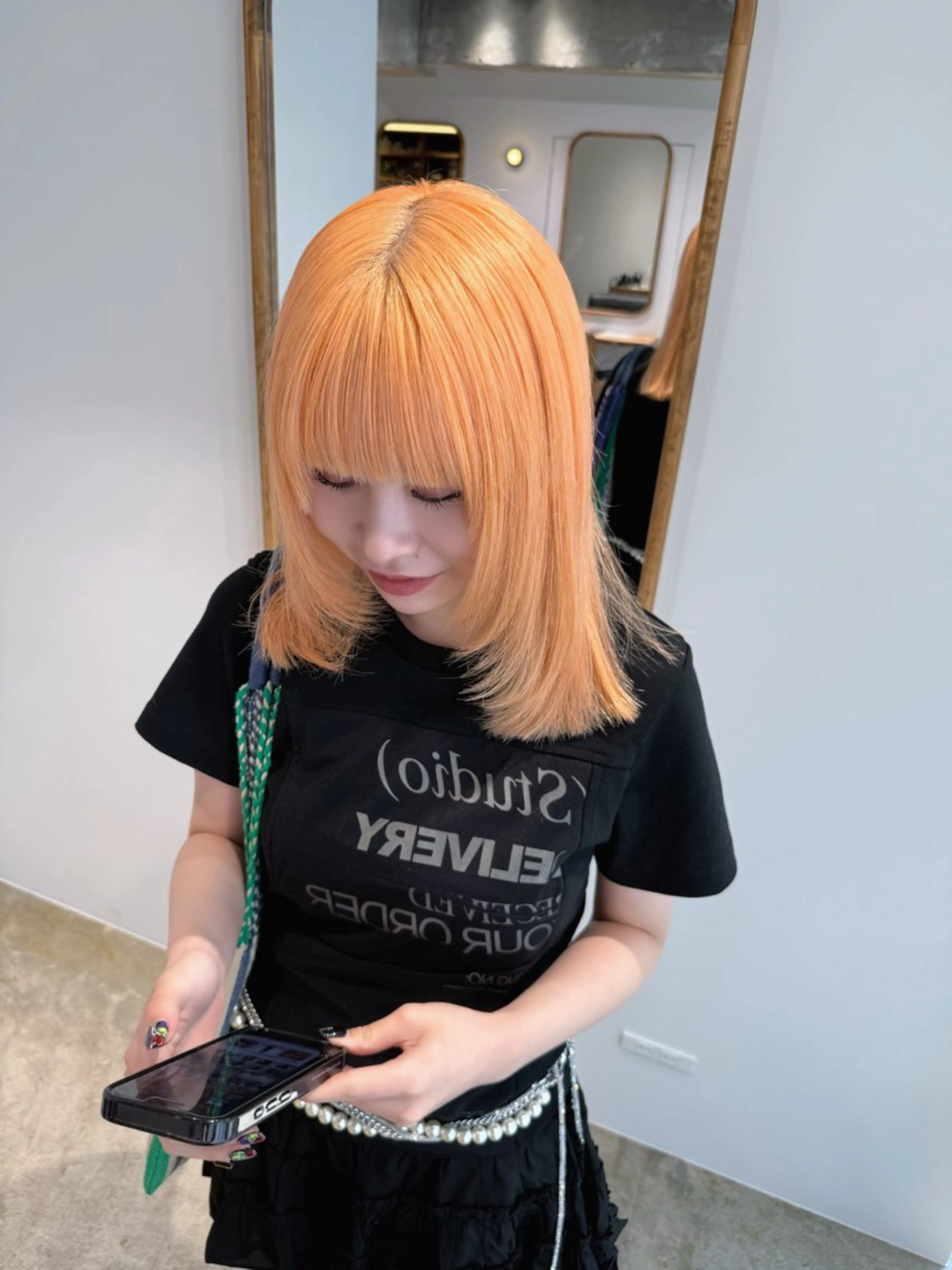 ミディアム カラー オレンジ miyuki .のヘアスタイル