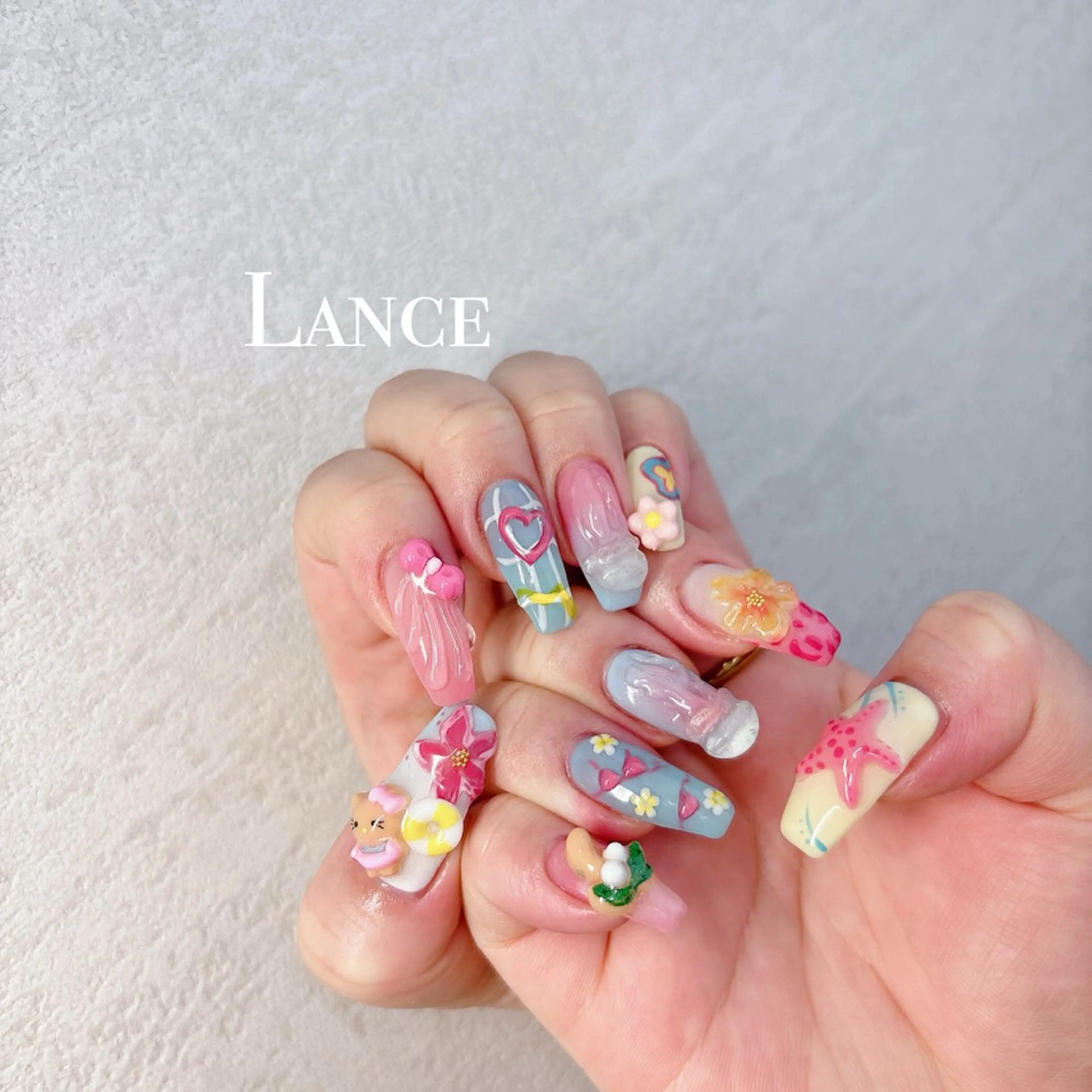 ネイル オーロラネイル ブルー フットネイル 氷ネイル・うるうるネイル キラキラネイル ハンドネイル Lance nailのネイルデザイン