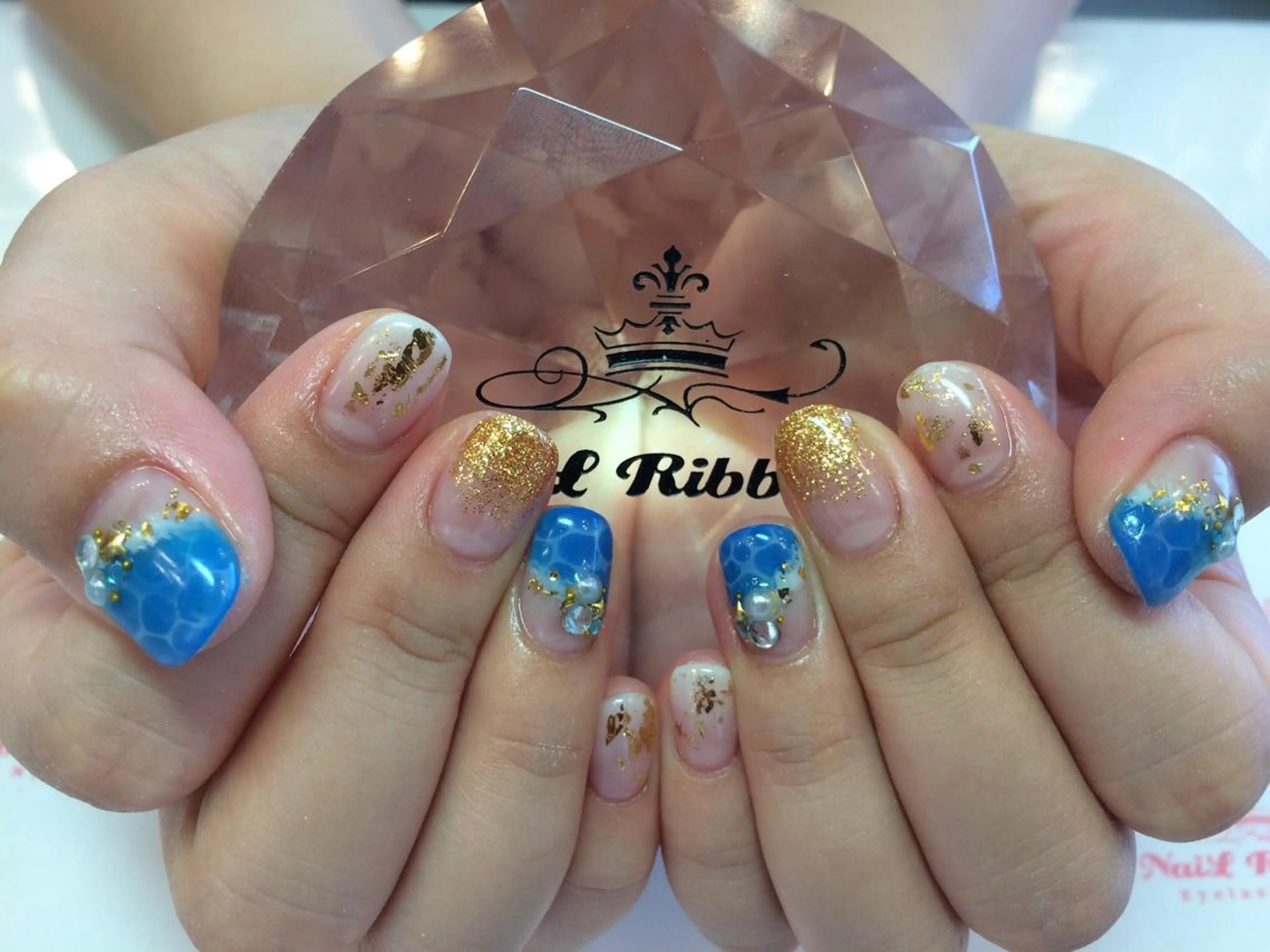 ネイル ネイルリボン 受付スタッフのネイルデザイン