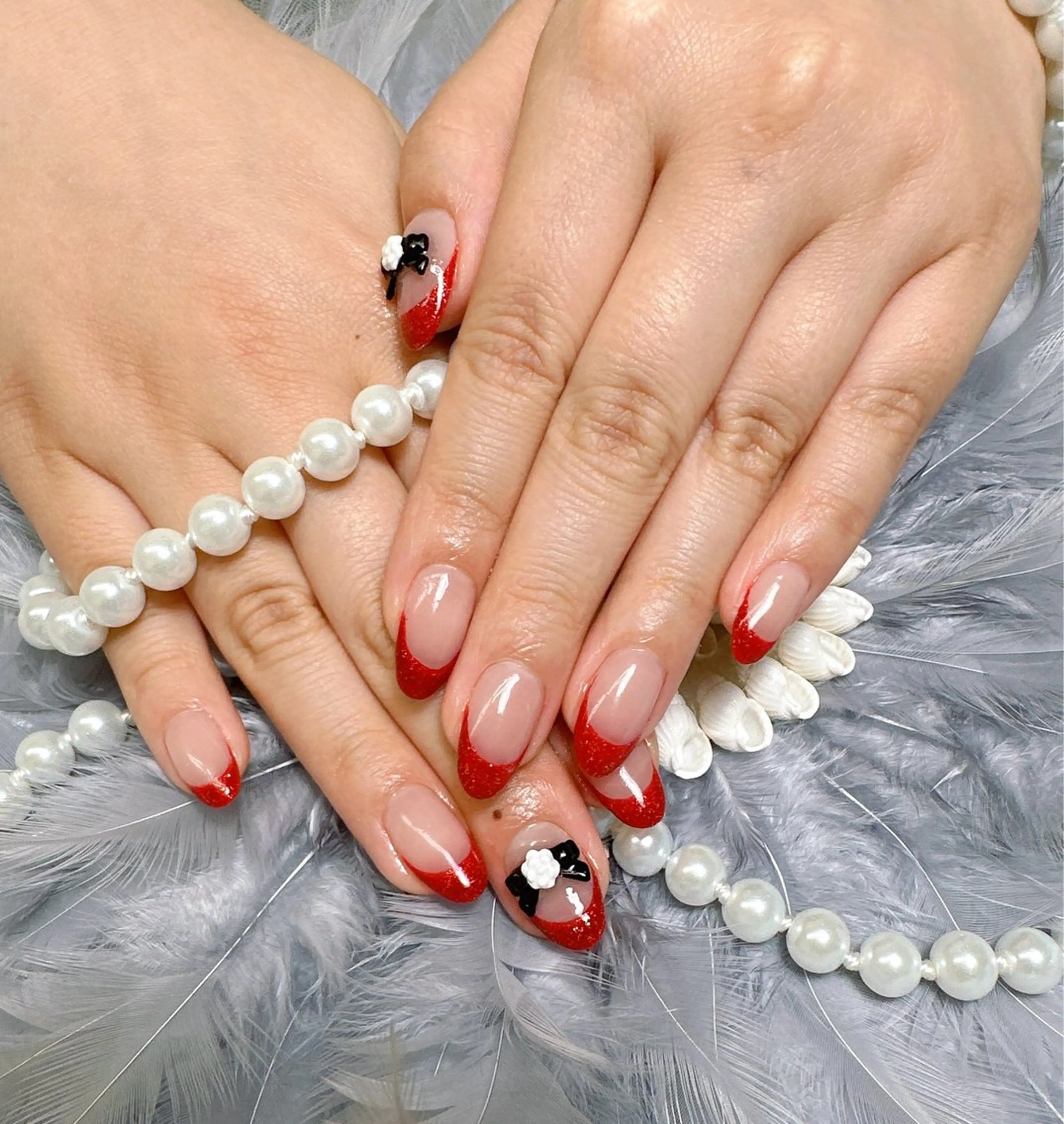 ネイル フレンチネイル ラメ(グリッター) 赤色 ハンドネイル Pretty Nail Salonのネイルデザイン