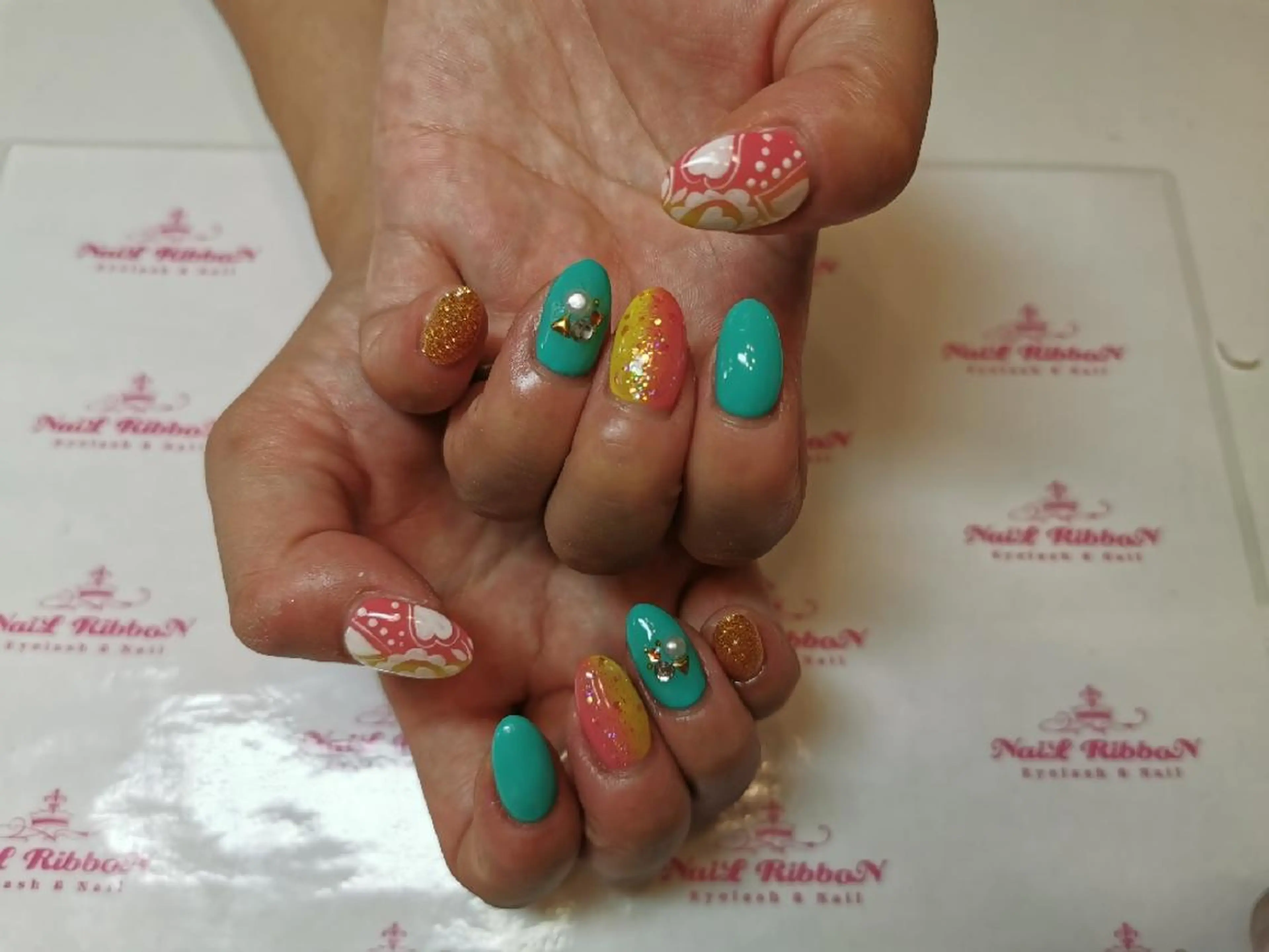 ネイル ハンドネイル ネイルリボン 受付スタッフのネイルデザイン