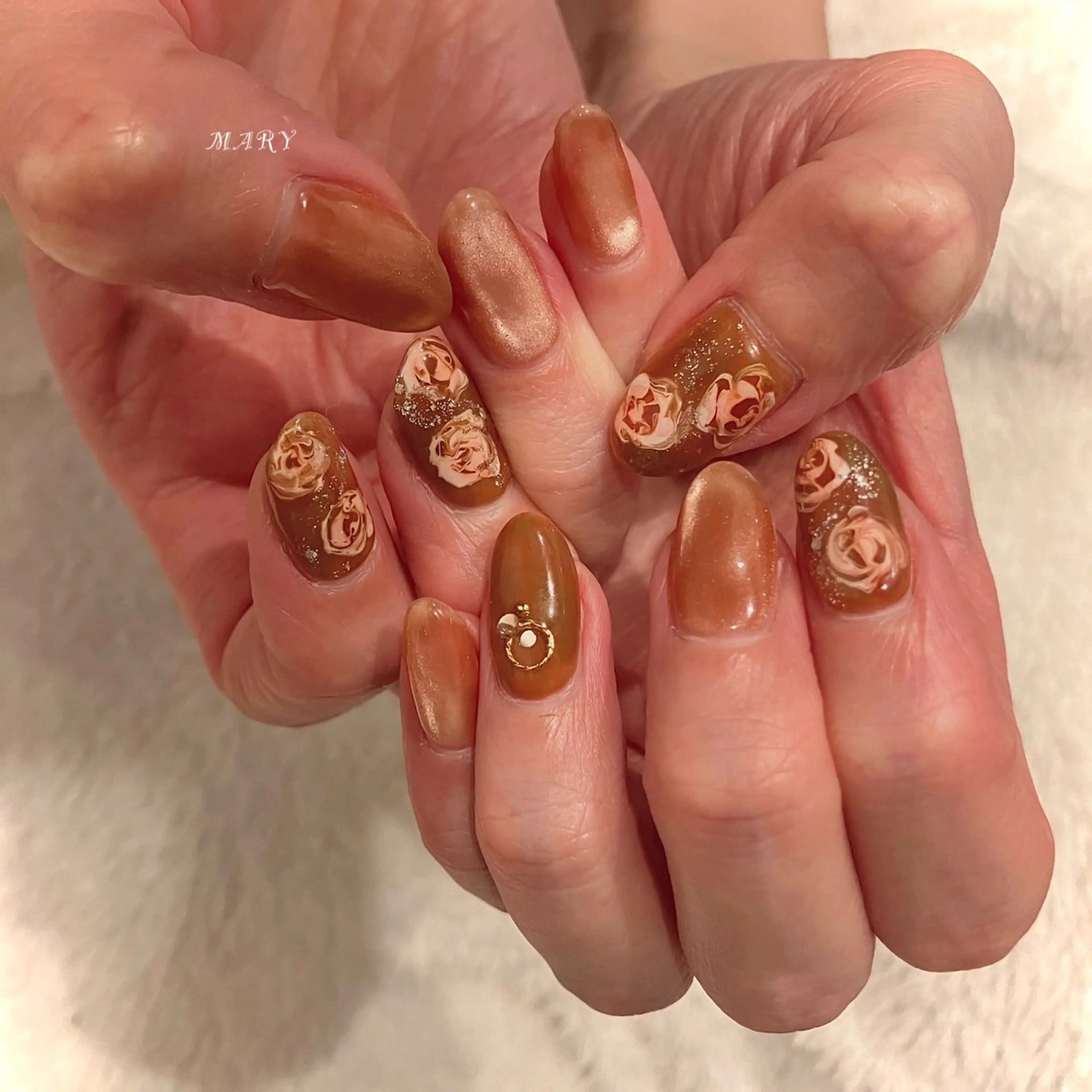 ネイル キラキラネイル マグネットネイル ニュアンスネイル ワンカラーネイル オレンジ ハンドネイル Mary nail .narumiのネイルデザイン