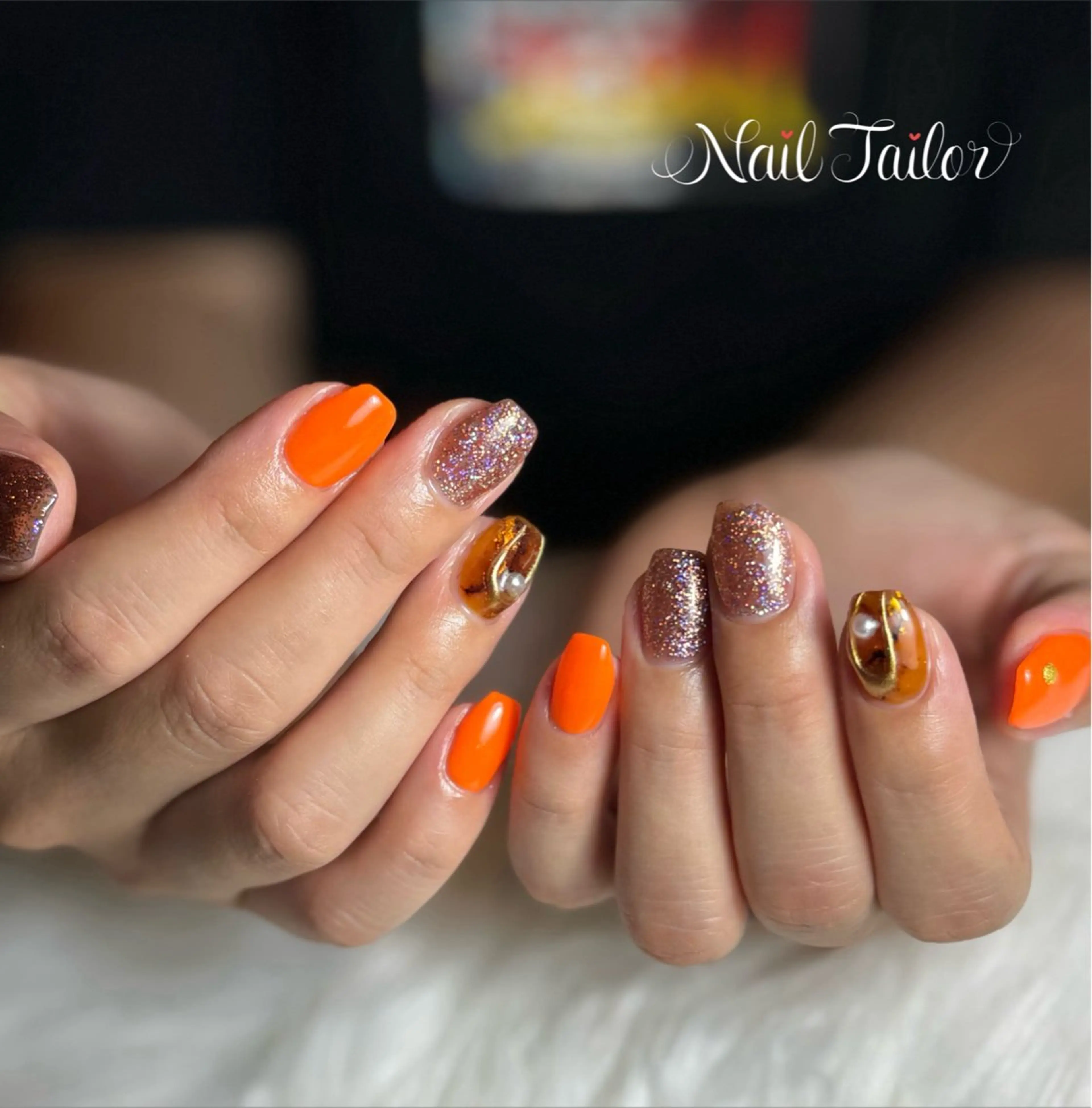 ネイル フラッシュネイル キラキラネイル ワンカラーネイル オレンジ スクエアネイル ハンドネイル NailTailor ネイルテイラーのネイルデザイン