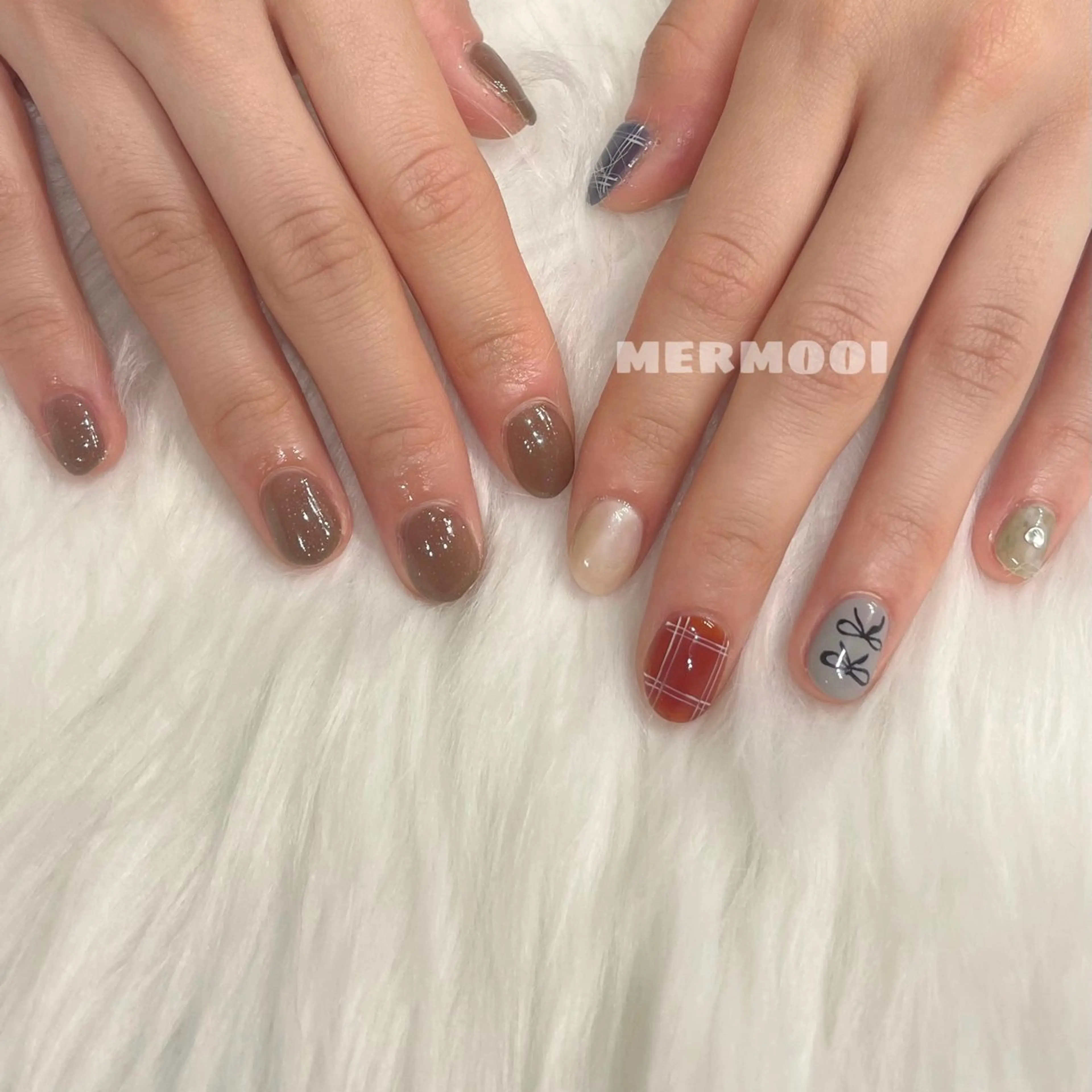 ネイル 韓国ネイル リボン melumooi nailのネイルデザイン