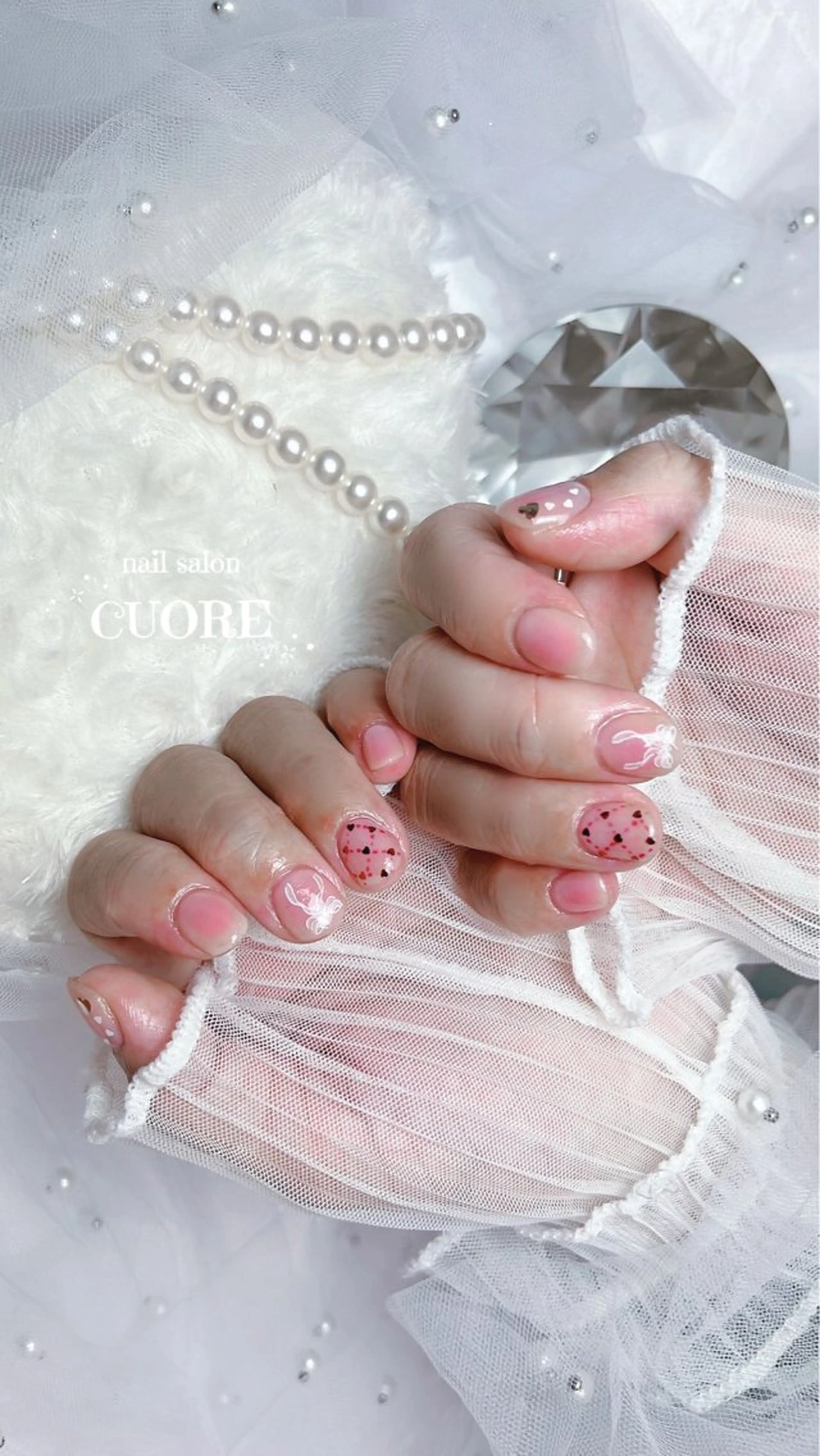 ネイル チークネイル ハート リボン バレンタイン nail salon CUOREのネイルデザイン