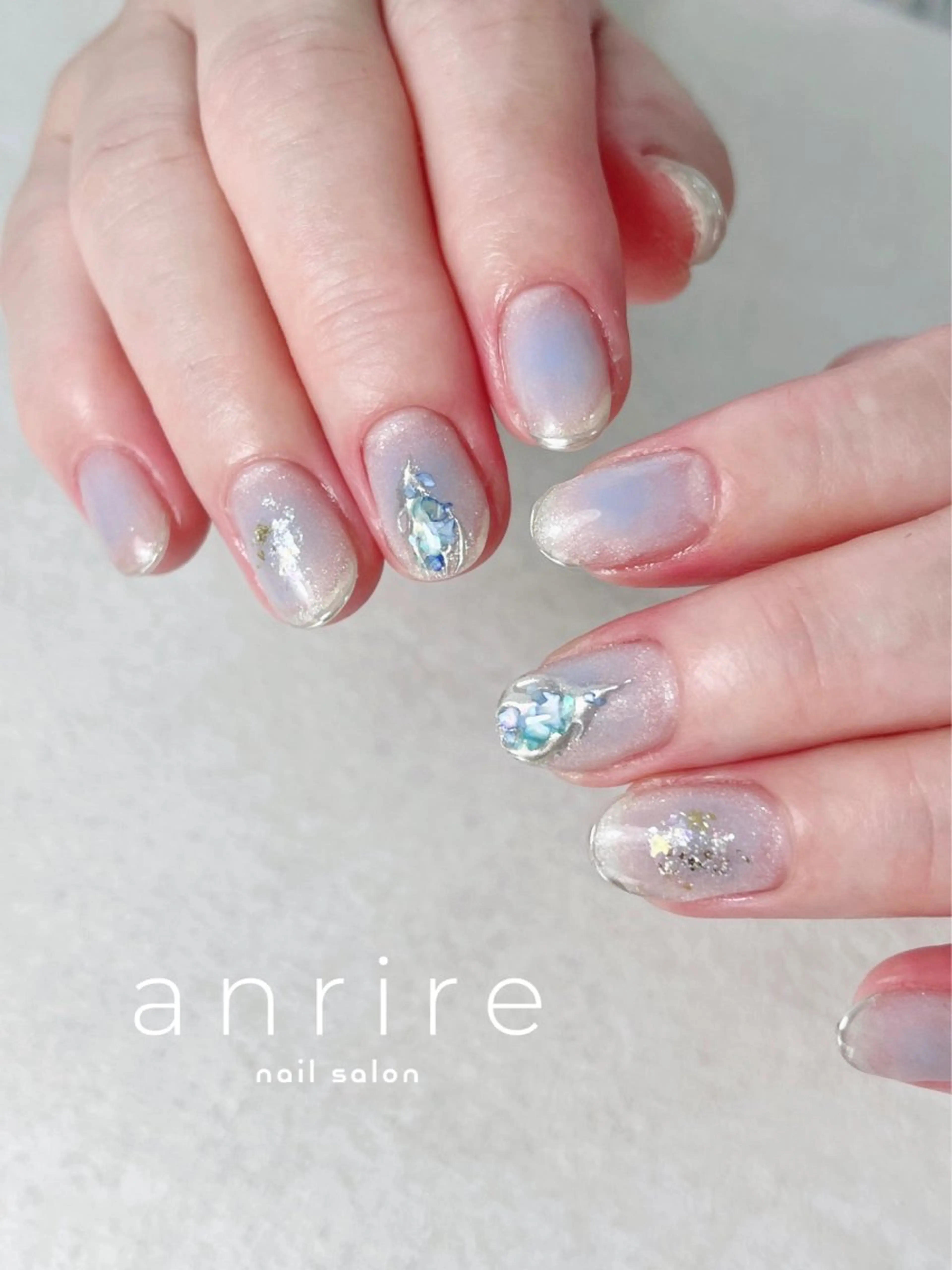 ネイル ブルー チークネイル ジェルネイル キラキラネイル ラメ(グリッター) ハンドネイル nailsalon anrireのネイルデザイン