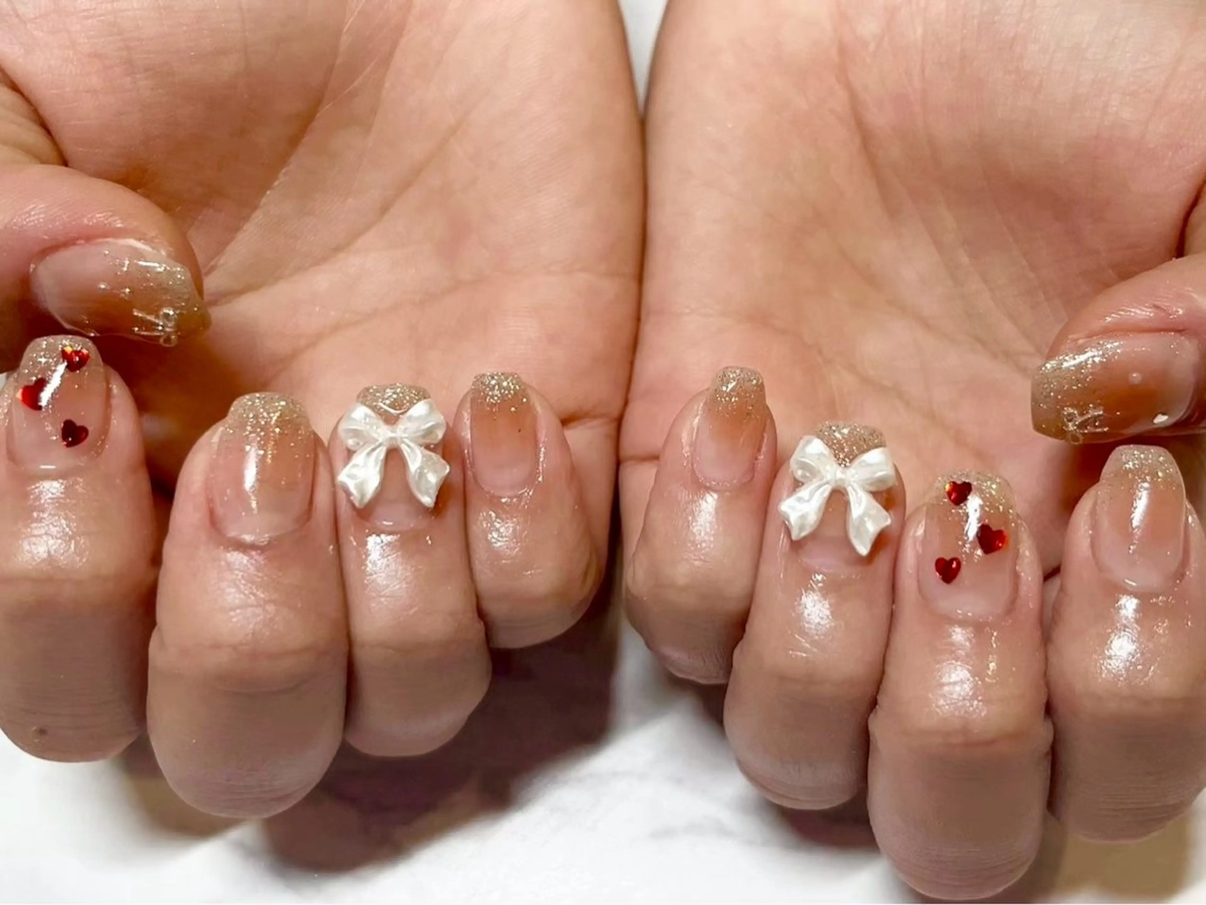 ネイル チークネイル オレンジ 🫧ちゅるん/韓国 Ayano𓈒🎀のネイルデザイン