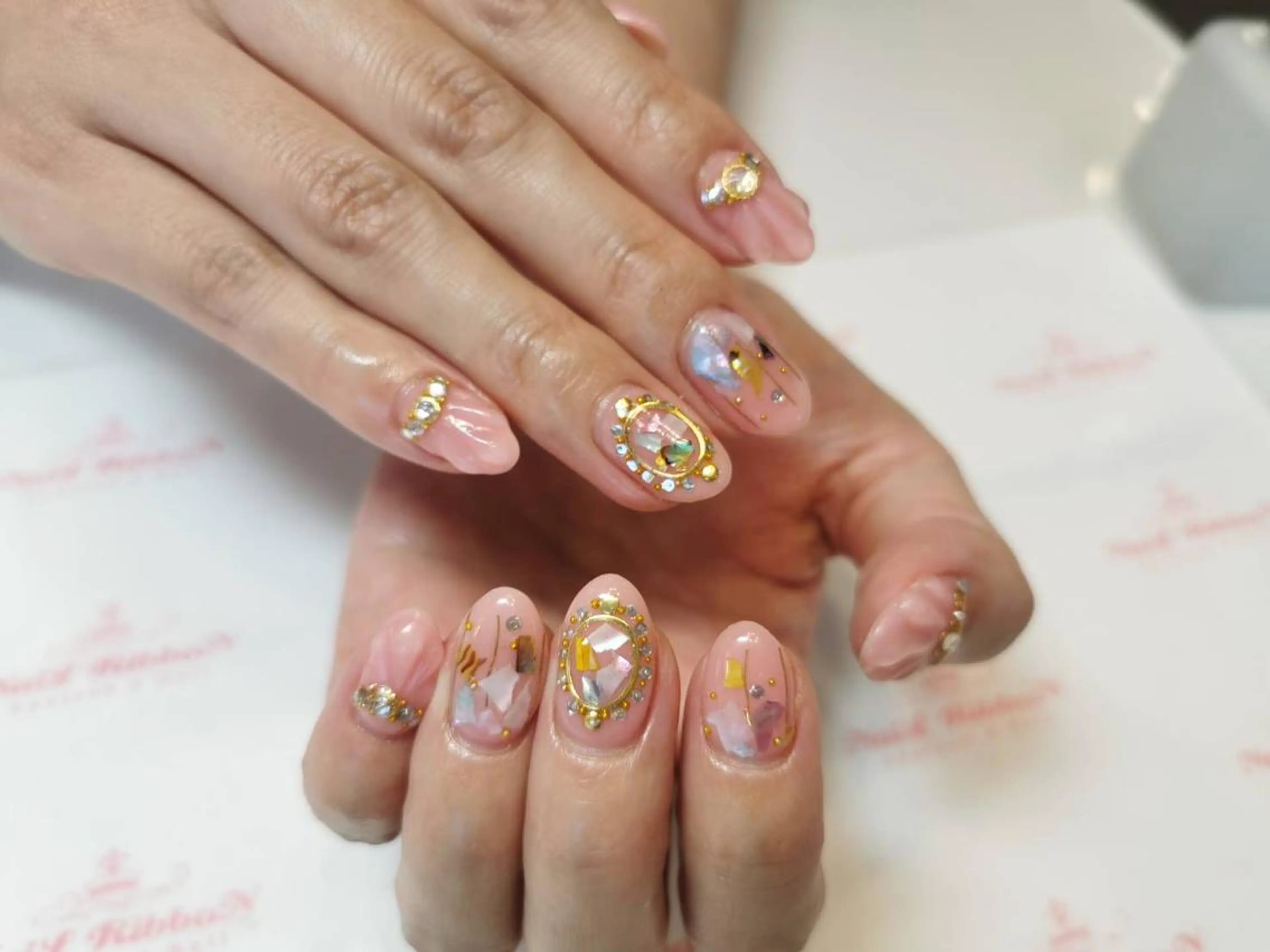 ネイル ネイルリボン 受付スタッフのネイルデザイン