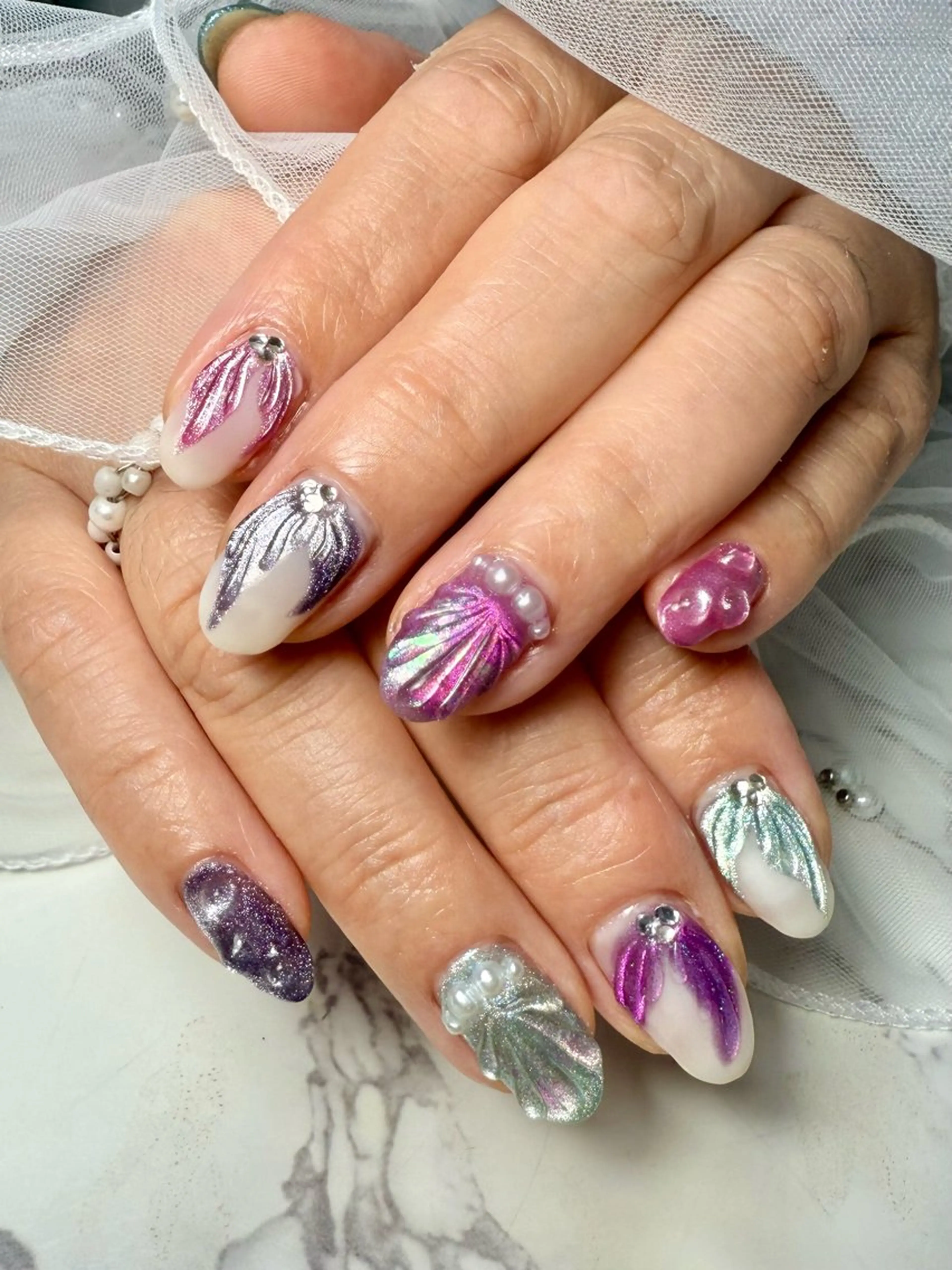 ネイル アートネイル 氷ネイル・うるうるネイル キラキラネイル ラメ(グリッター) マグネットネイル M.N_ nailのネイルデザイン