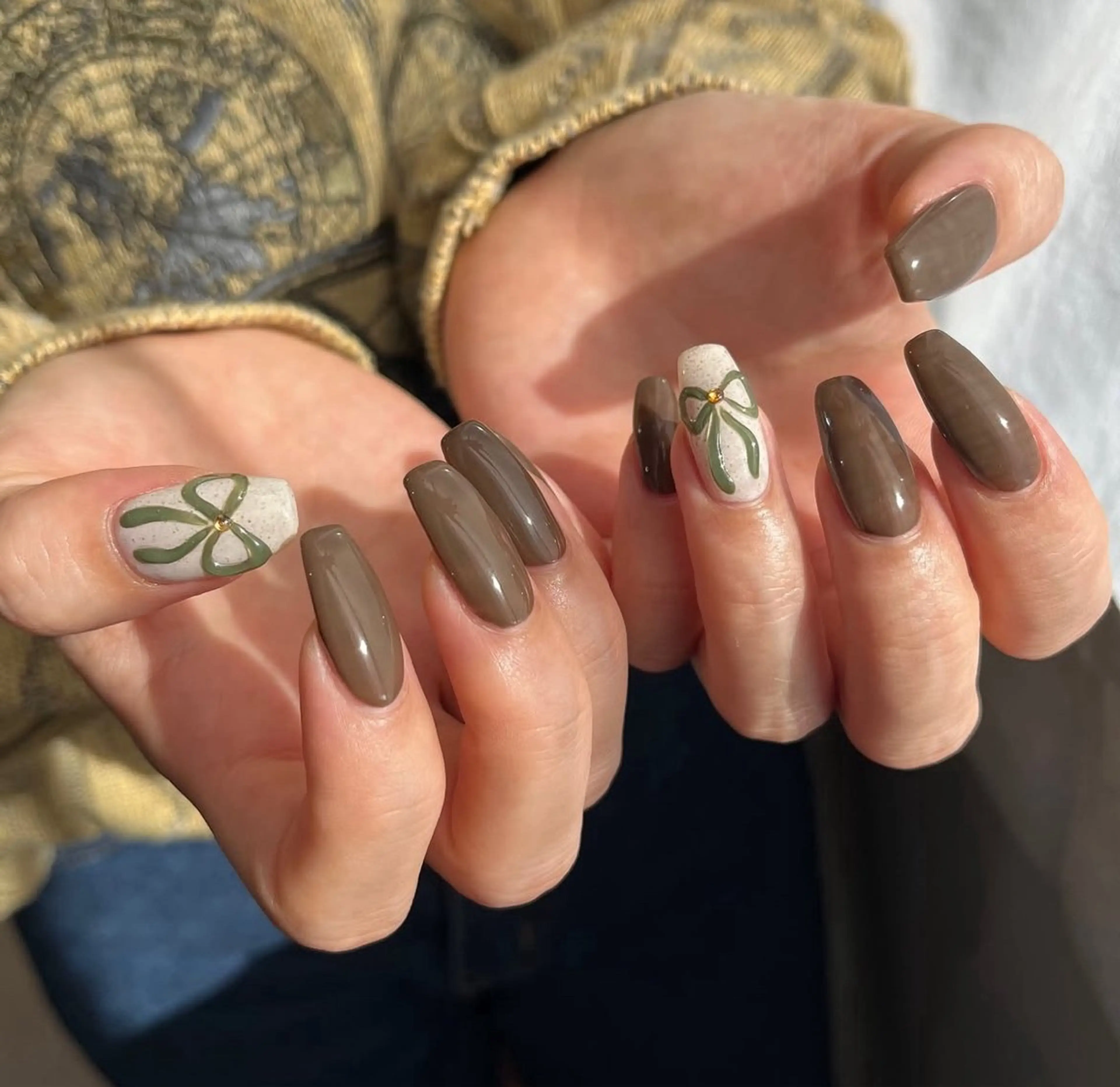 ネイル ブラウン ワンカラーネイル リボン CLALA MIYUのネイルデザイン