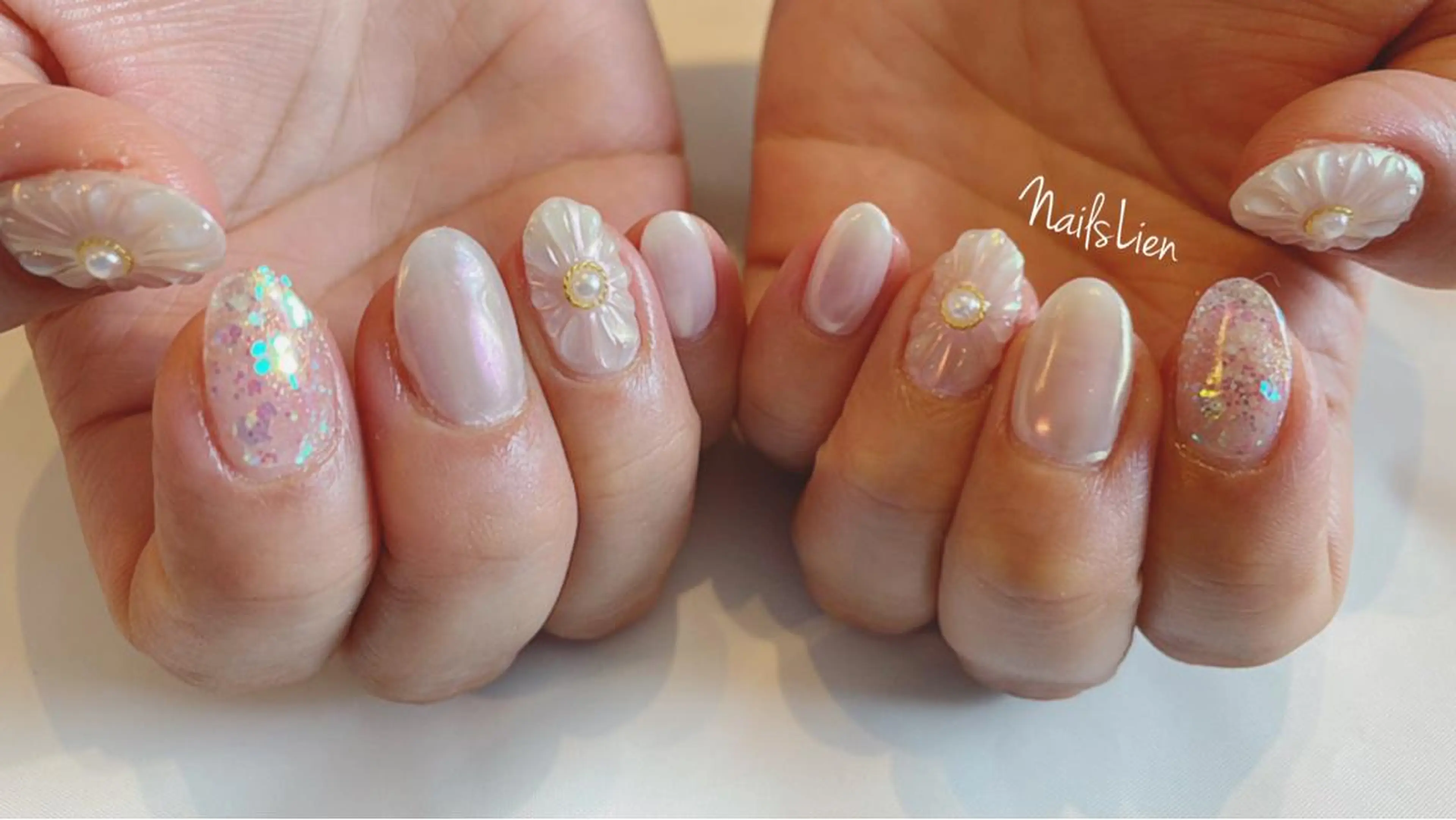 ネイル アニマル柄 フラワーネイル フレンチネイル ガラスフレンチ グラデーション studio e n / RiNのネイルデザイン