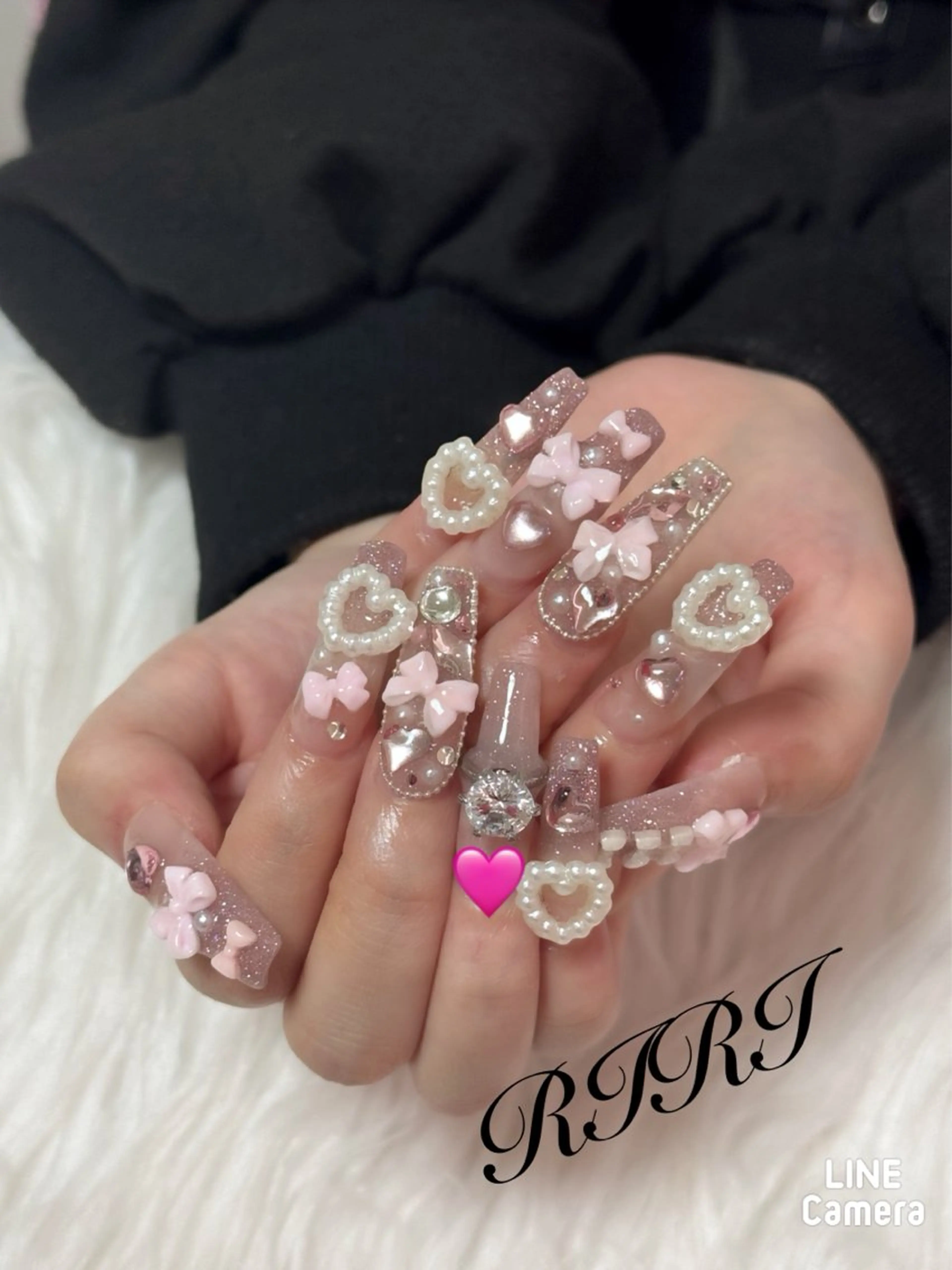 ネイル フラッシュネイル ジェルネイル ロングネイル ピンク リボン ハンドネイル riri オーナーのネイルデザイン