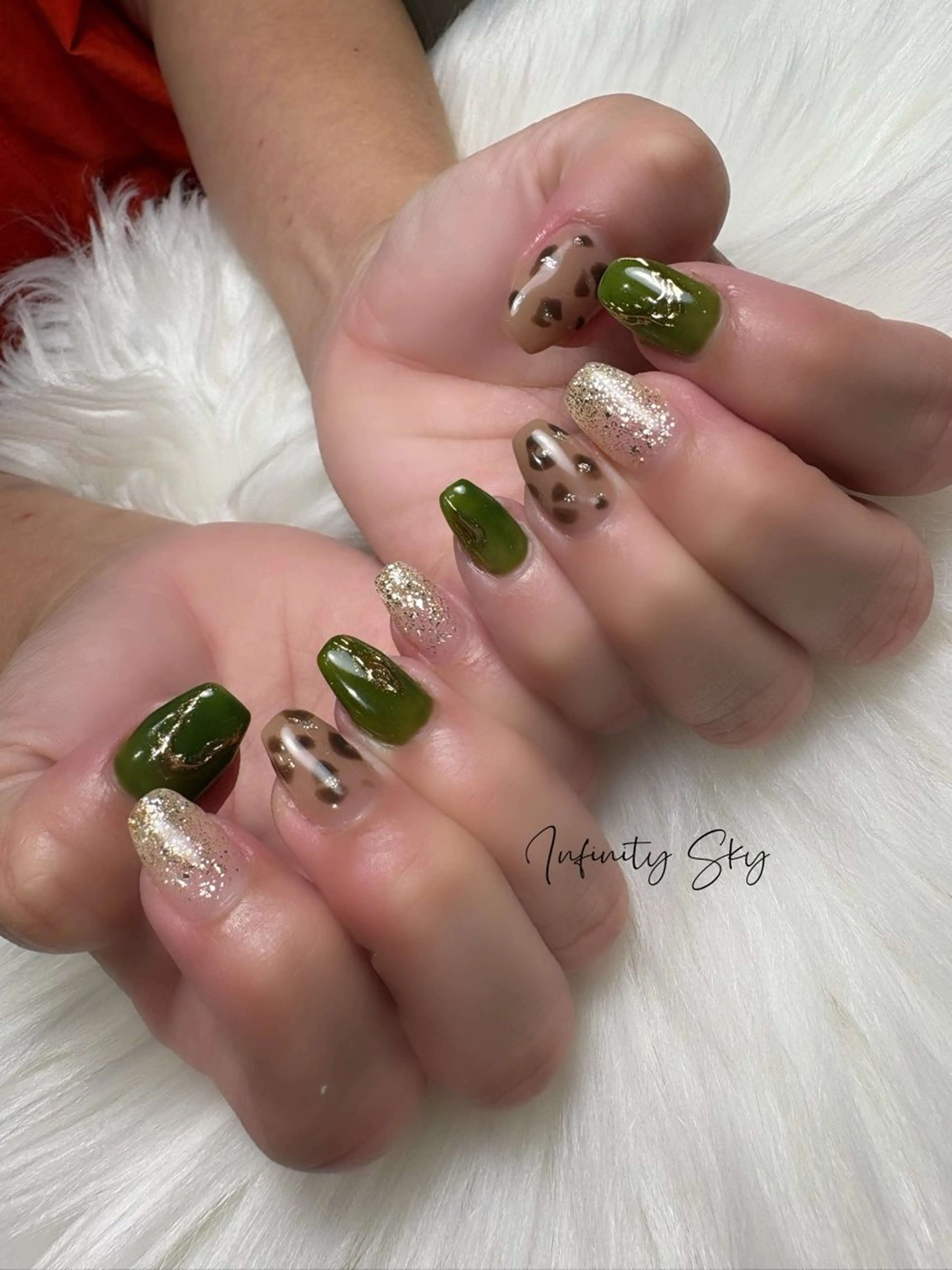 ネイル アニマル柄 グリーン infinity skyのネイルデザイン