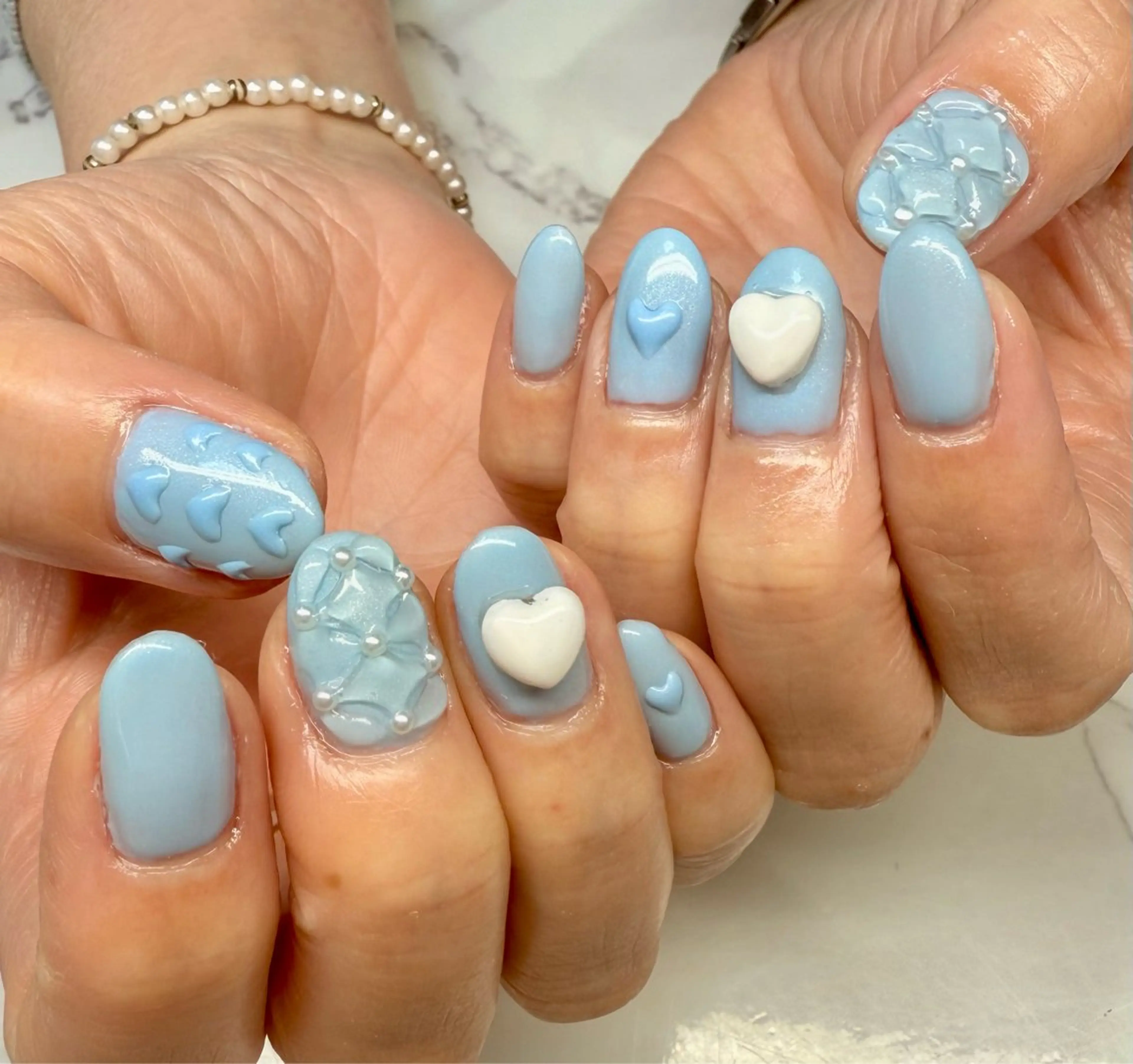 ネイル アートネイル チークネイル フレンチネイル ハート 氷ネイル・うるうるネイル M.N_ nailのネイルデザイン