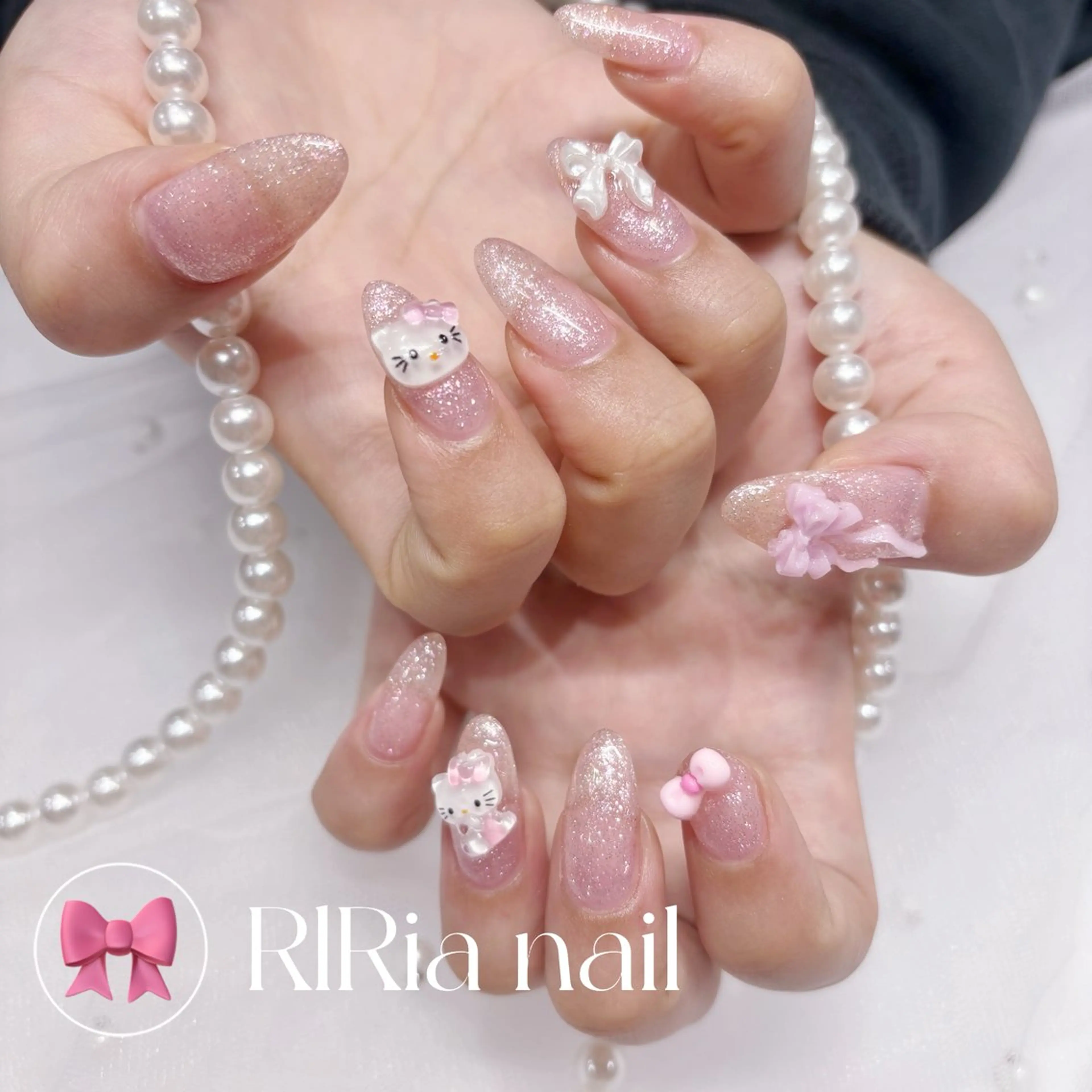 ネイル キラキラネイル ピンク リボン ハンドネイル 🎀RIRia nail🎀のネイルデザイン