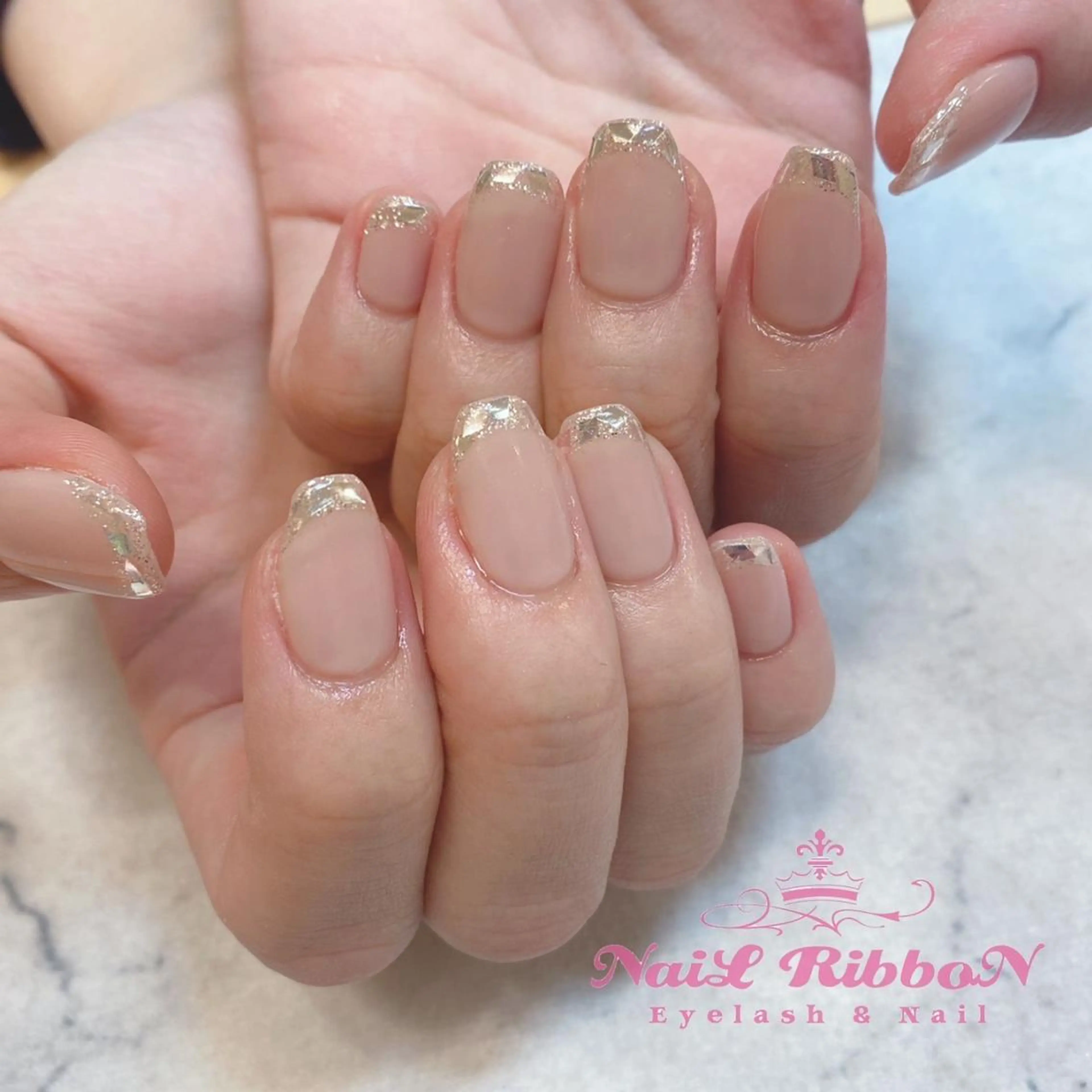 ネイル ネイルリボン 受付スタッフのネイルデザイン