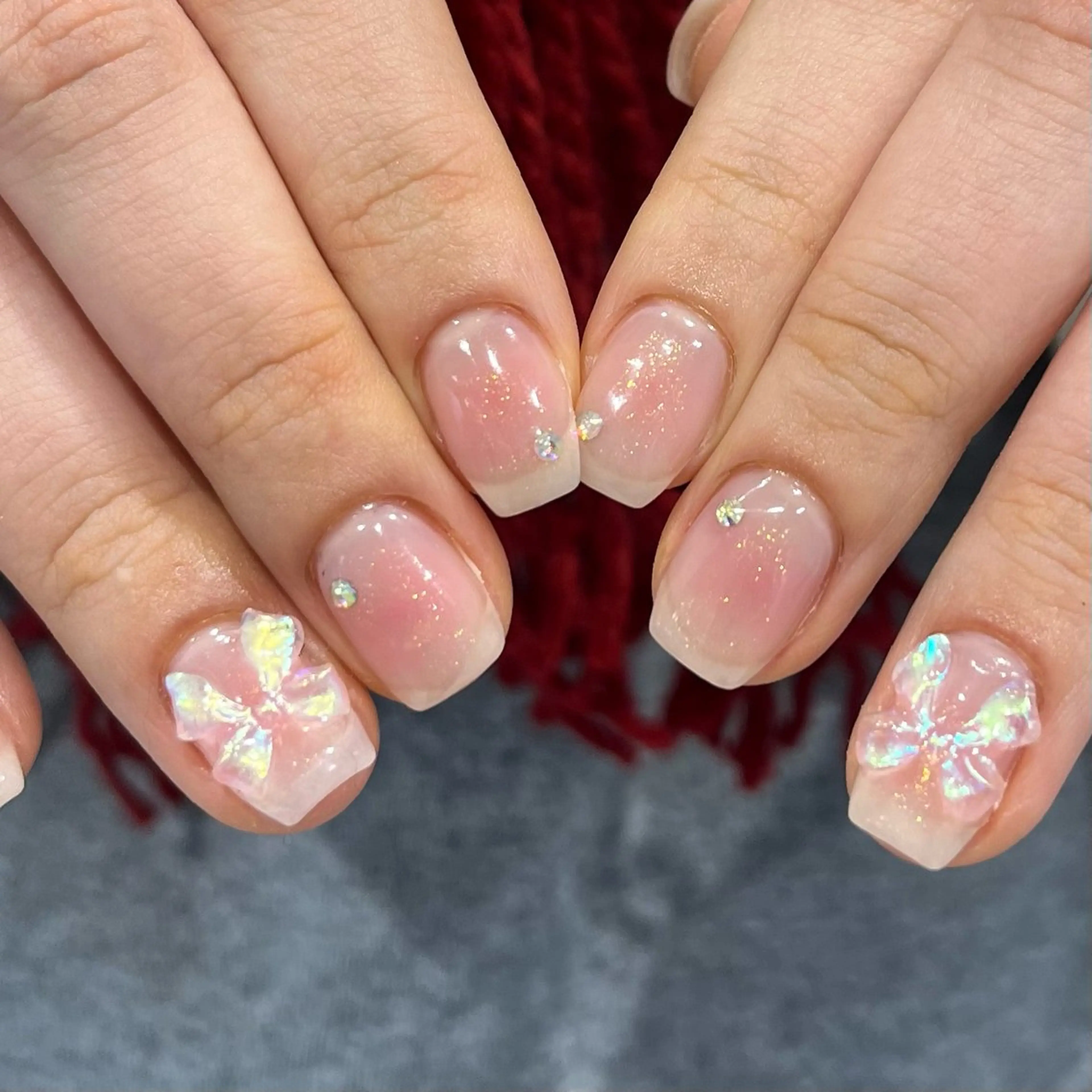 ネイル チークネイル ラメ(グリッター) リボン ストーンネイル ワンホンネイル ハンドネイル NORA nail UMEDA MAIのネイルデザイン