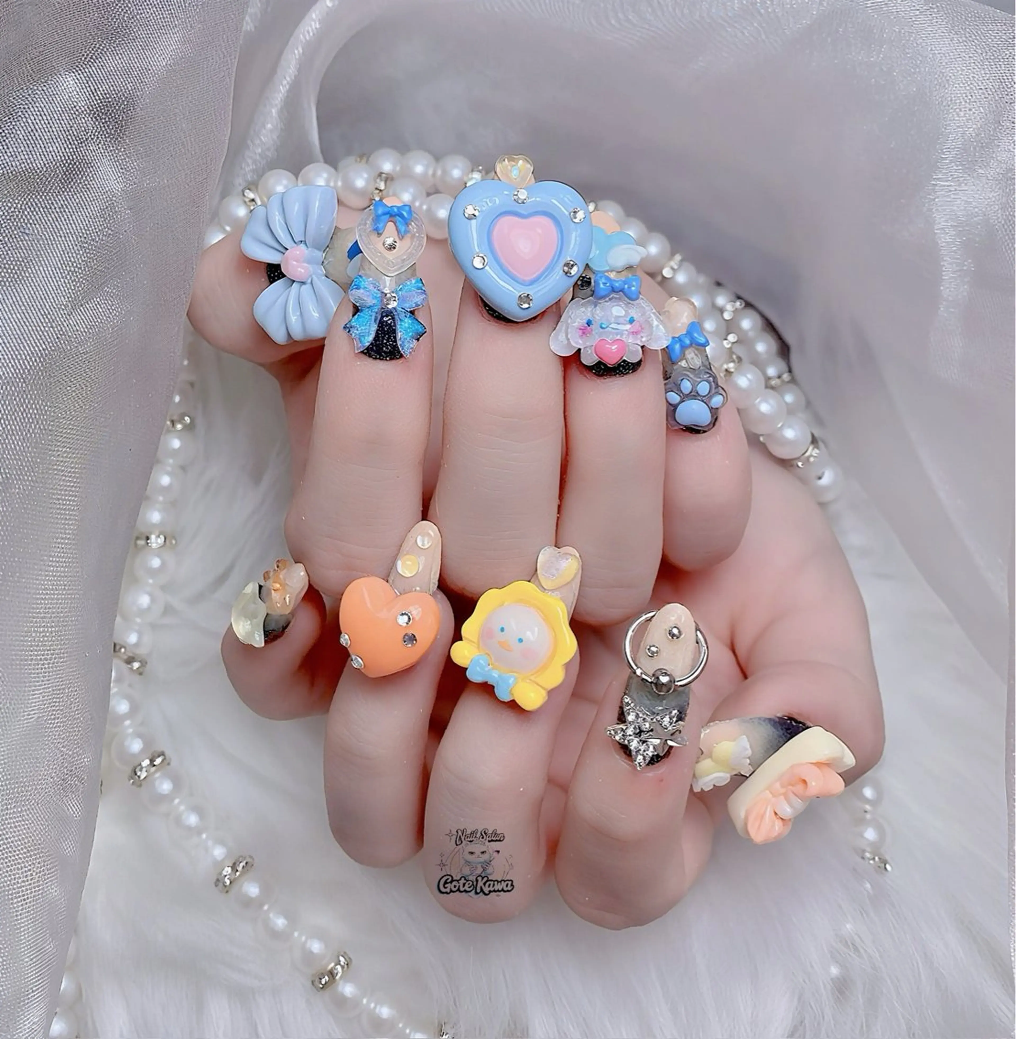 ネイル アートネイル 長さ出し キラキラネイル ピンク リボン ハンドネイル ハンドケア Gote Kawa nail salonのネイルデザイン