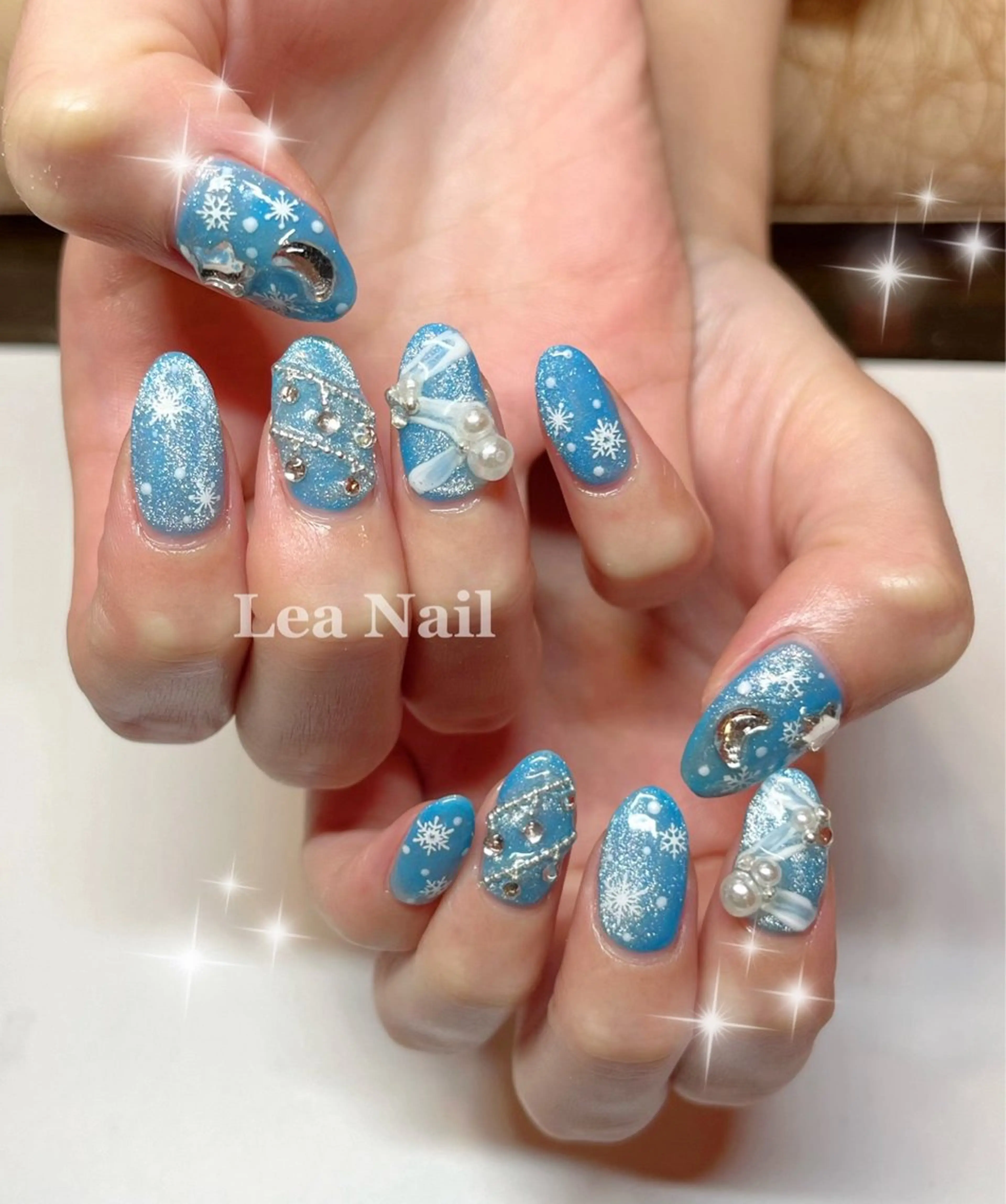 ネイル キラキラネイル リボン 冬ネイル ハンドネイル Lea Nailのネイルデザイン