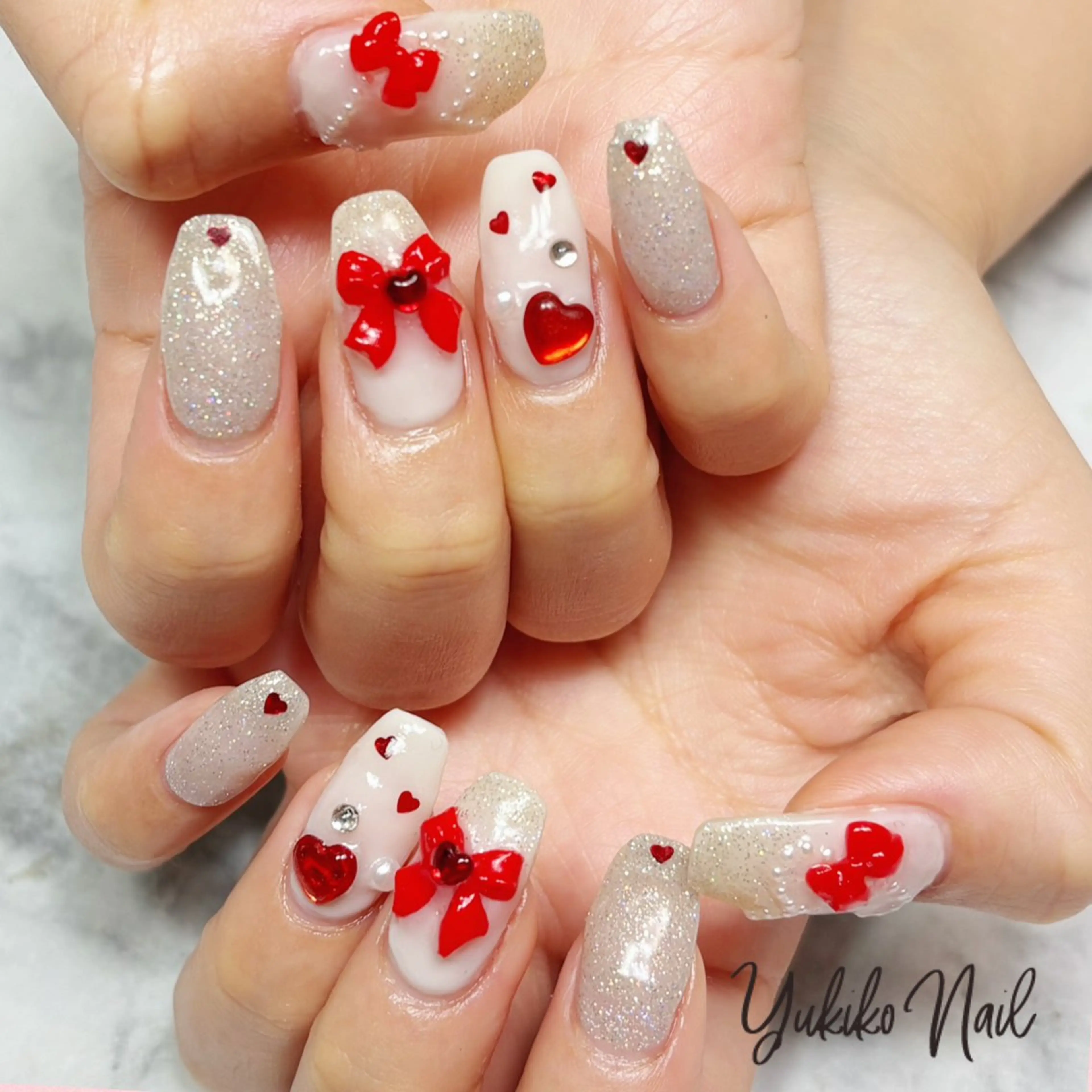 ネイル ガーリー ハート 韓国ネイル 赤色 リボン ハンドネイル ユキコ ネイルのネイルデザイン