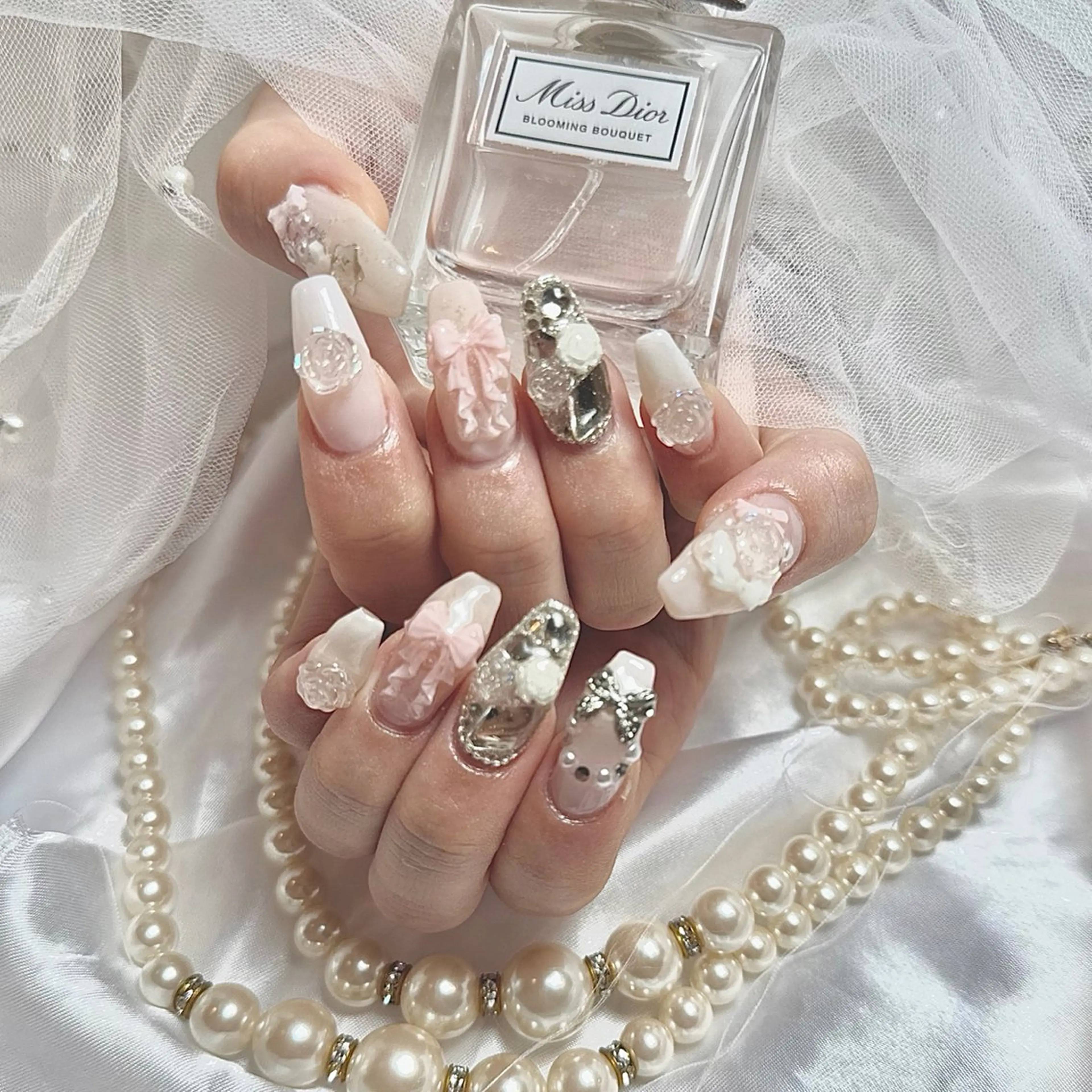 ロング ハンドネイル Conjunim MAMI🎀✨のネイルデザイン