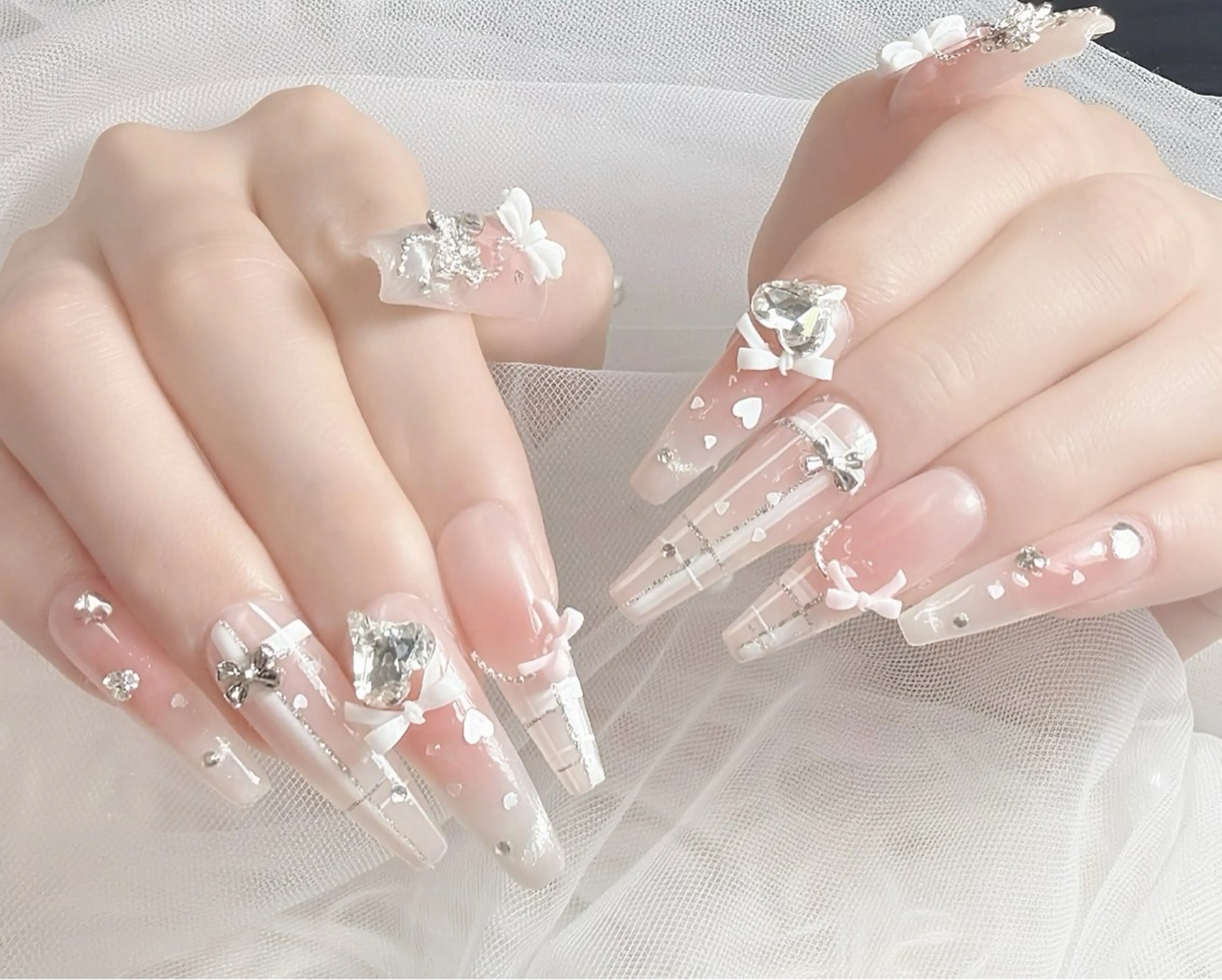 ネイル チークネイル リボン 春ネイル ワンホンネイル ハンドネイル ハンドケア Gote Kawa nail salonのネイルデザイン