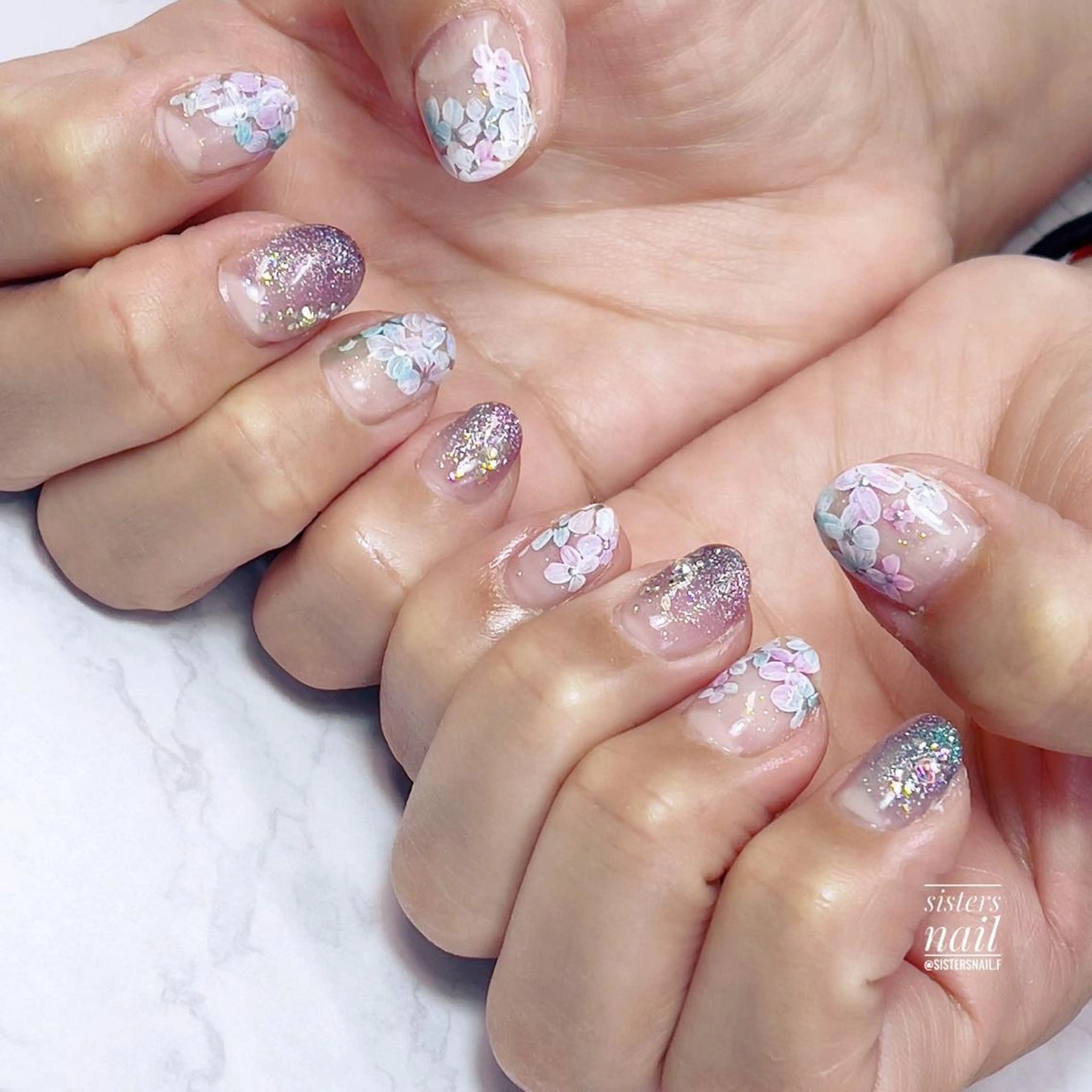 ネイル アートネイル ブルー キラキラネイル ラメ(グリッター) パープル sisters nail.fのネイルデザイン