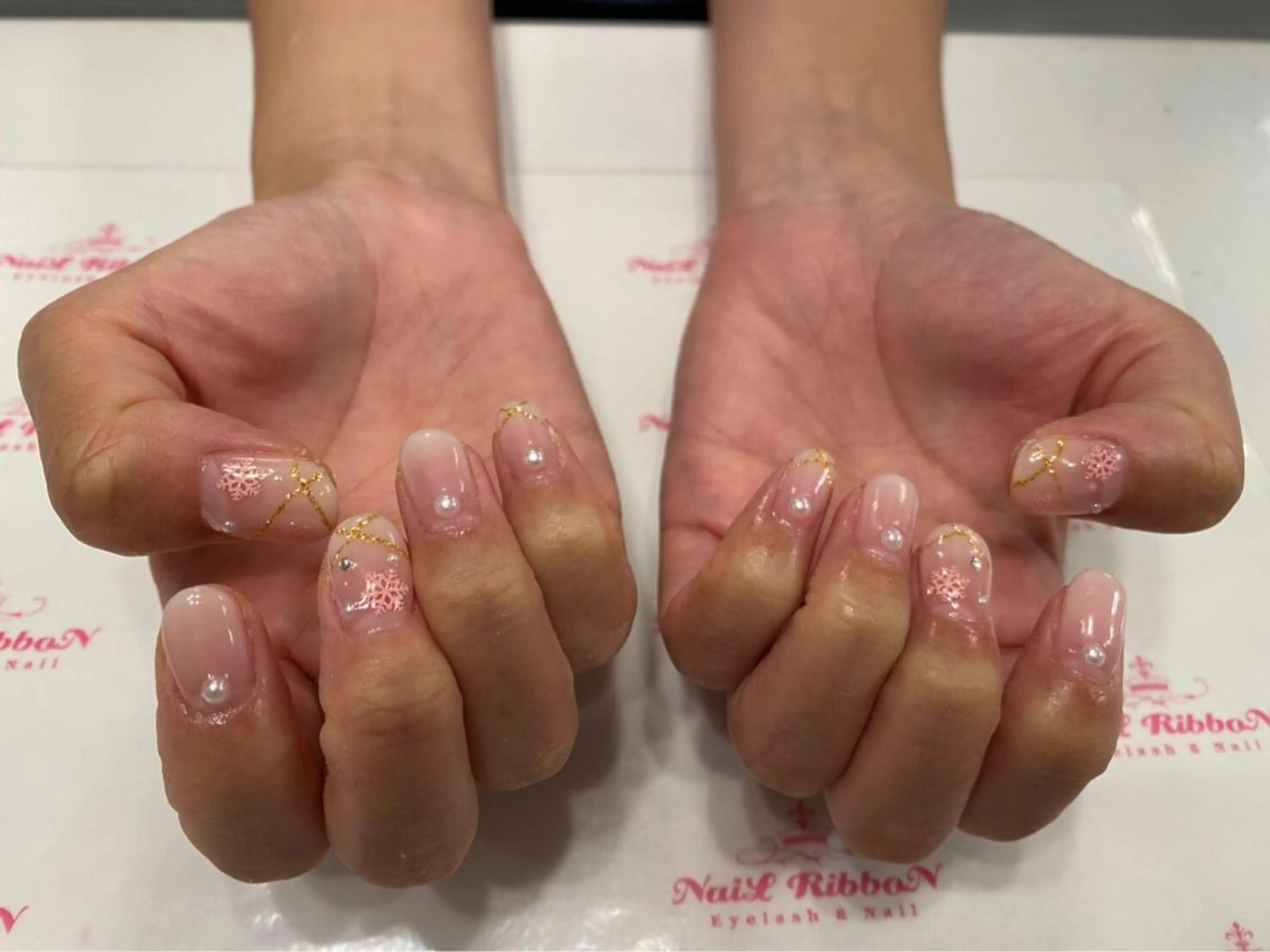 ネイル 春ネイル ネイルリボン 受付スタッフのネイルデザイン