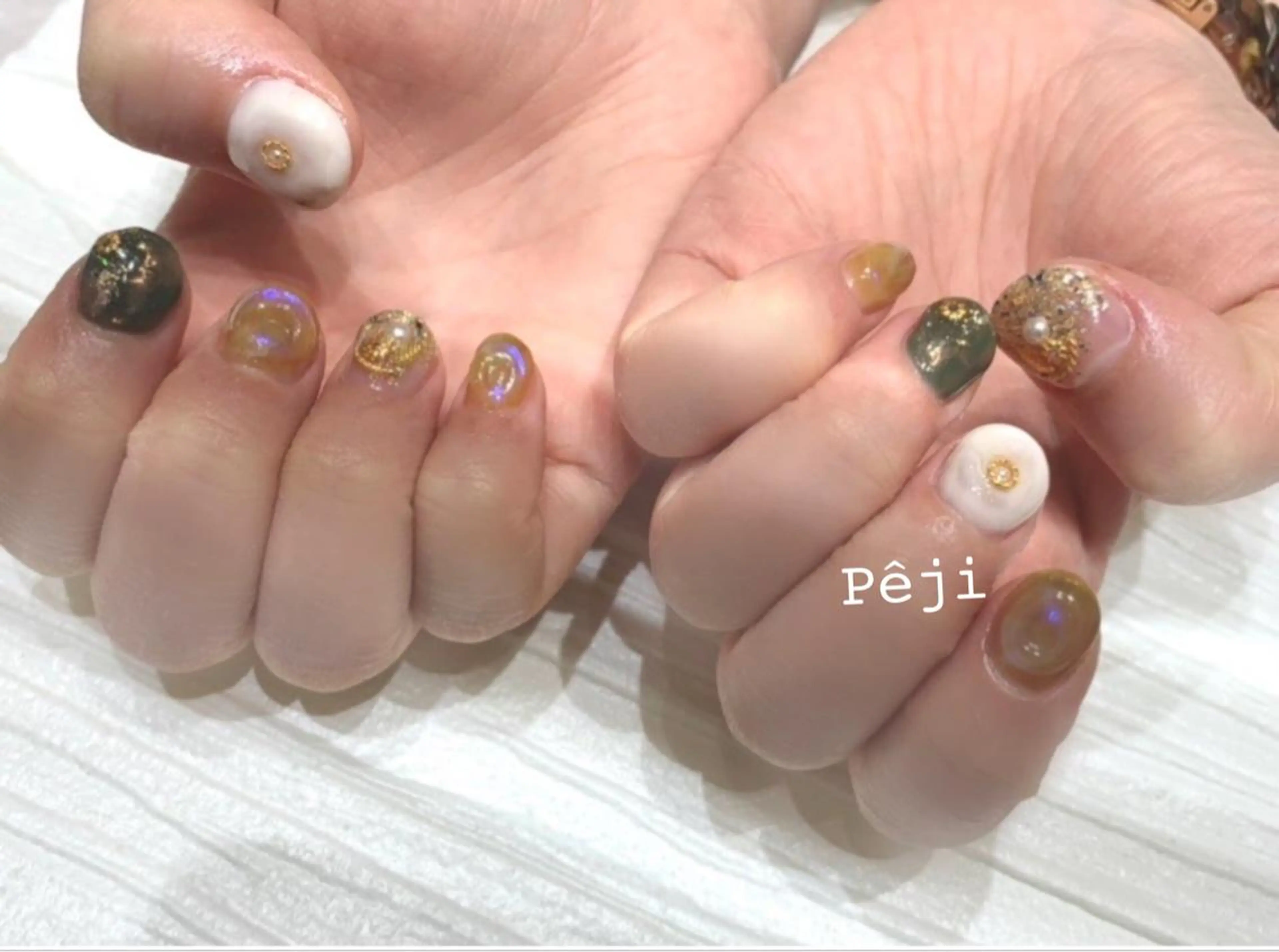 ショート m kaori𓃟のネイルデザイン