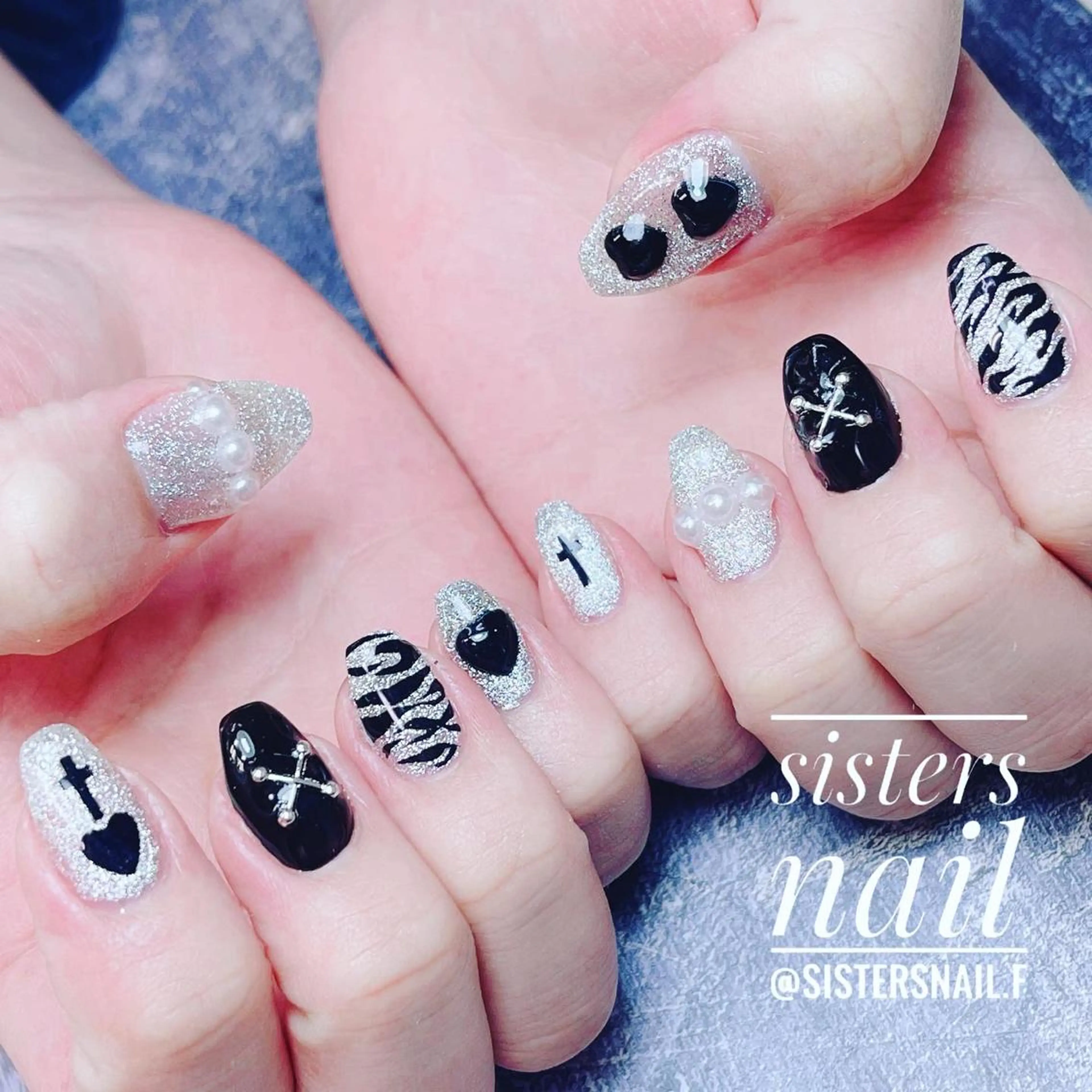 ネイル アニマル柄 アートネイル キラキラネイル マグネットネイル sisters nail.fのネイルデザイン