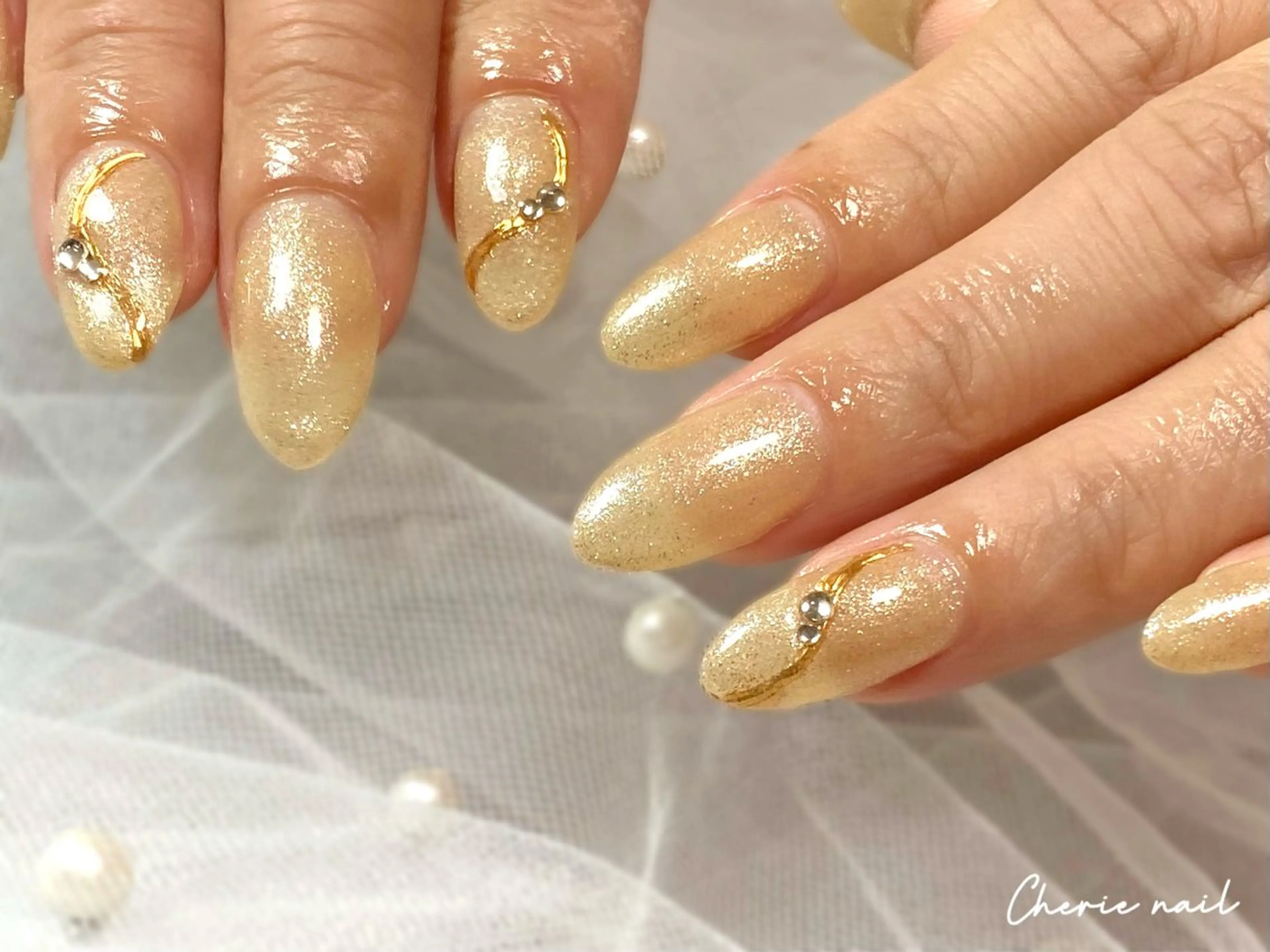 ネイル ジェルネイル ゴールド キラキラネイル ラメ(グリッター) ミラーネイル ハンドネイル Cherienail yunaのネイルデザイン