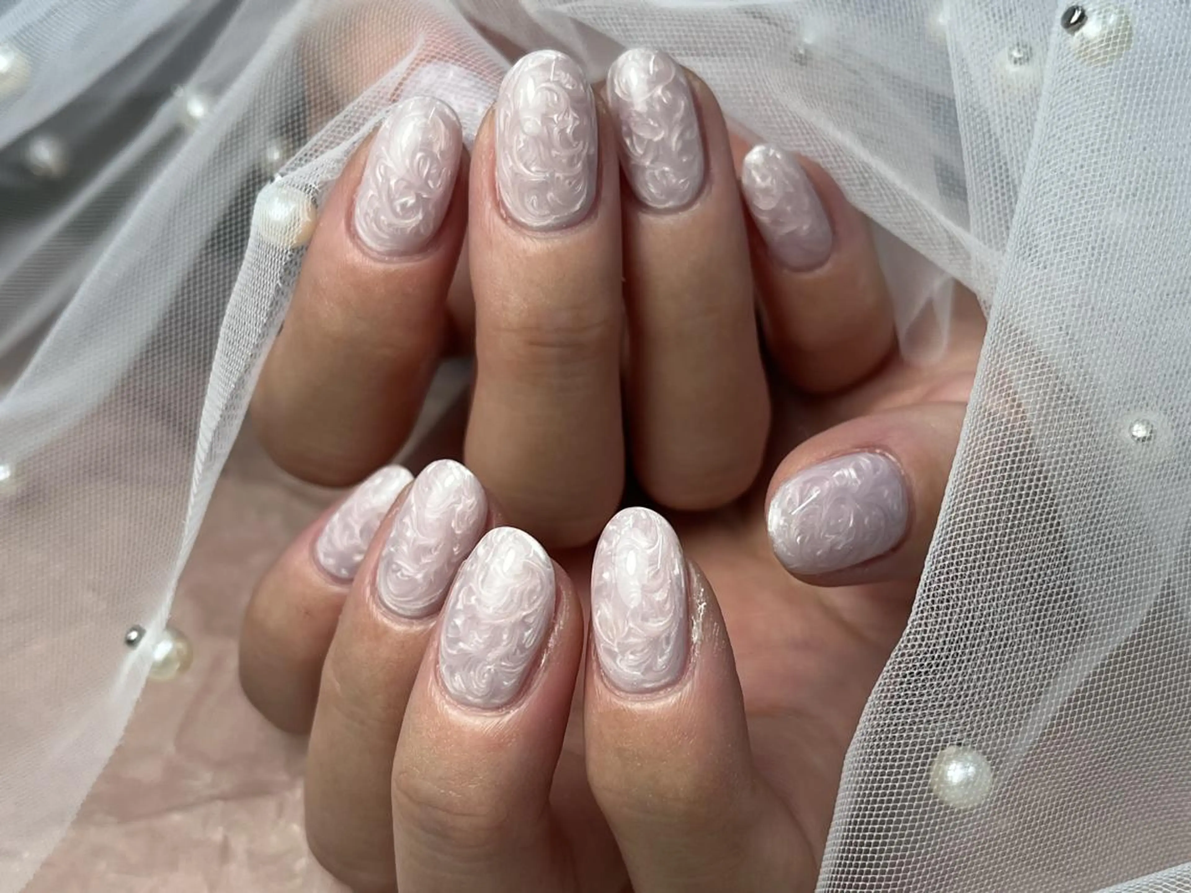 ネイル フラワーネイル ブライダルネイル ホワイト ハンドネイル ハンドケア ToliyDeliy Nail Salonのネイルデザイン