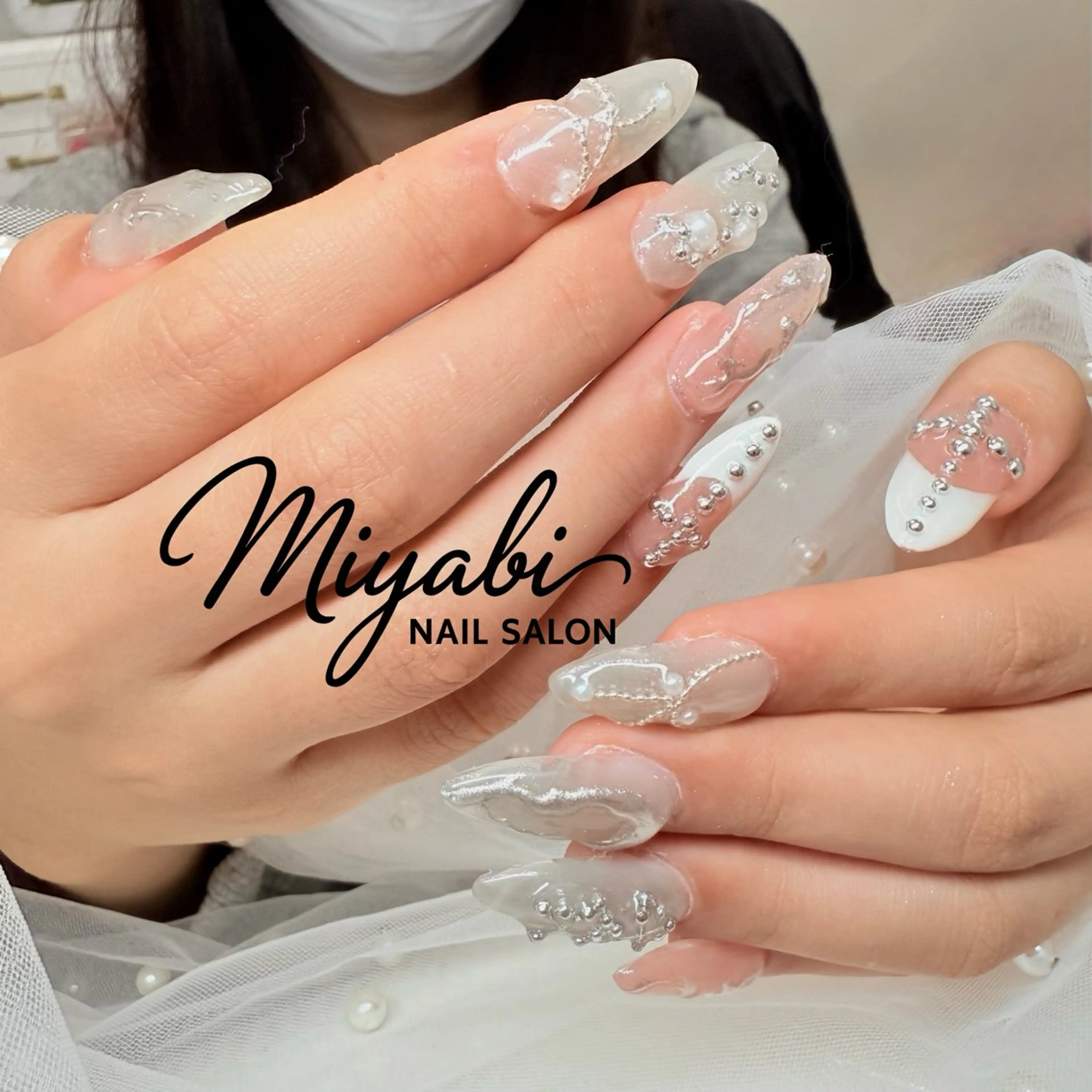 ネイル アートネイル クリアネイル ロングネイル シルバー ブライダルネイル ハンドネイル ハンドケア 古賀 佳織のネイルデザイン