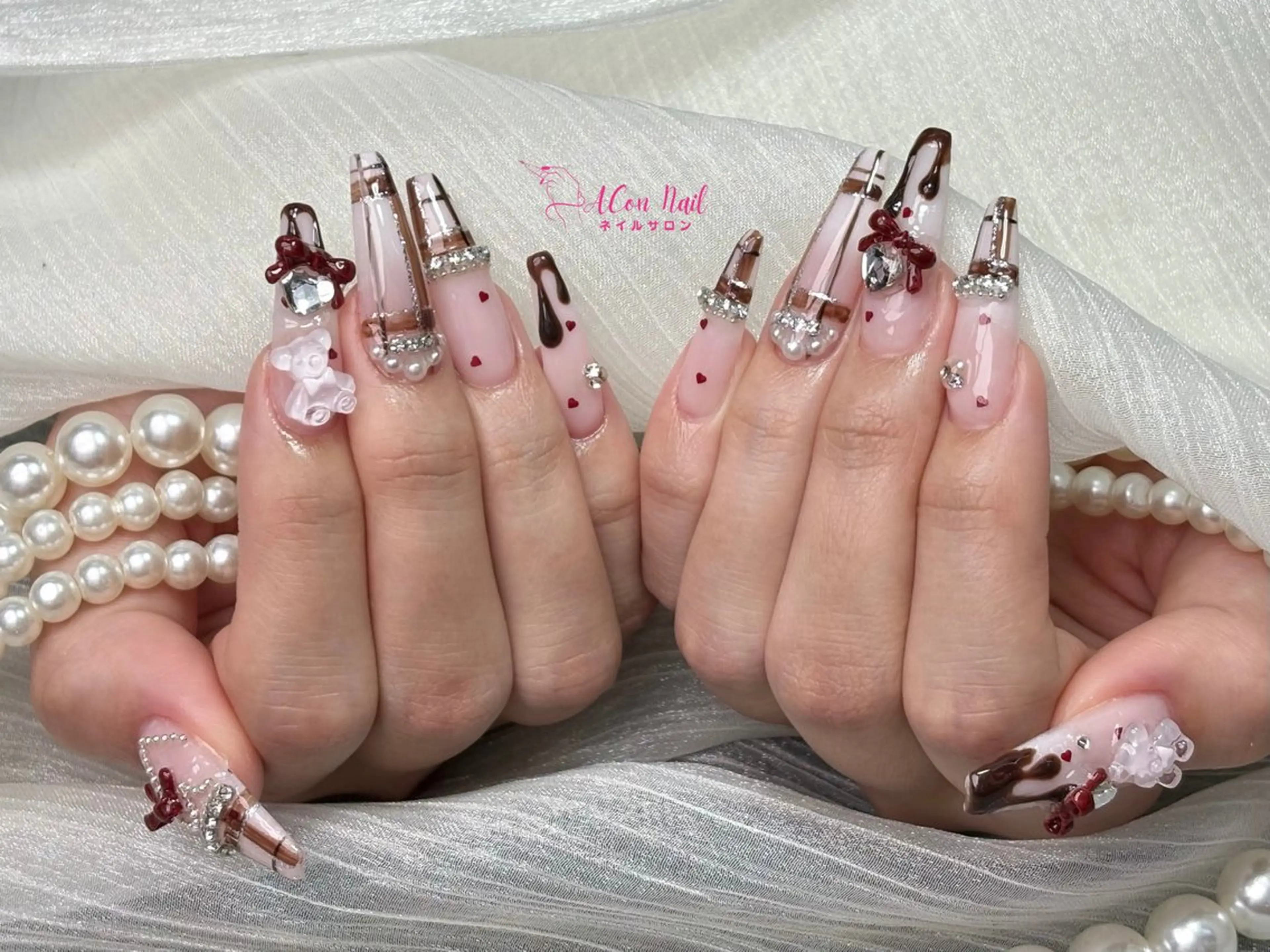 ネイル 桜ネイル 長さ出し フラワーネイル フレンチネイル ジェルネイル ハンドネイル ACon NailSalonのネイルデザイン