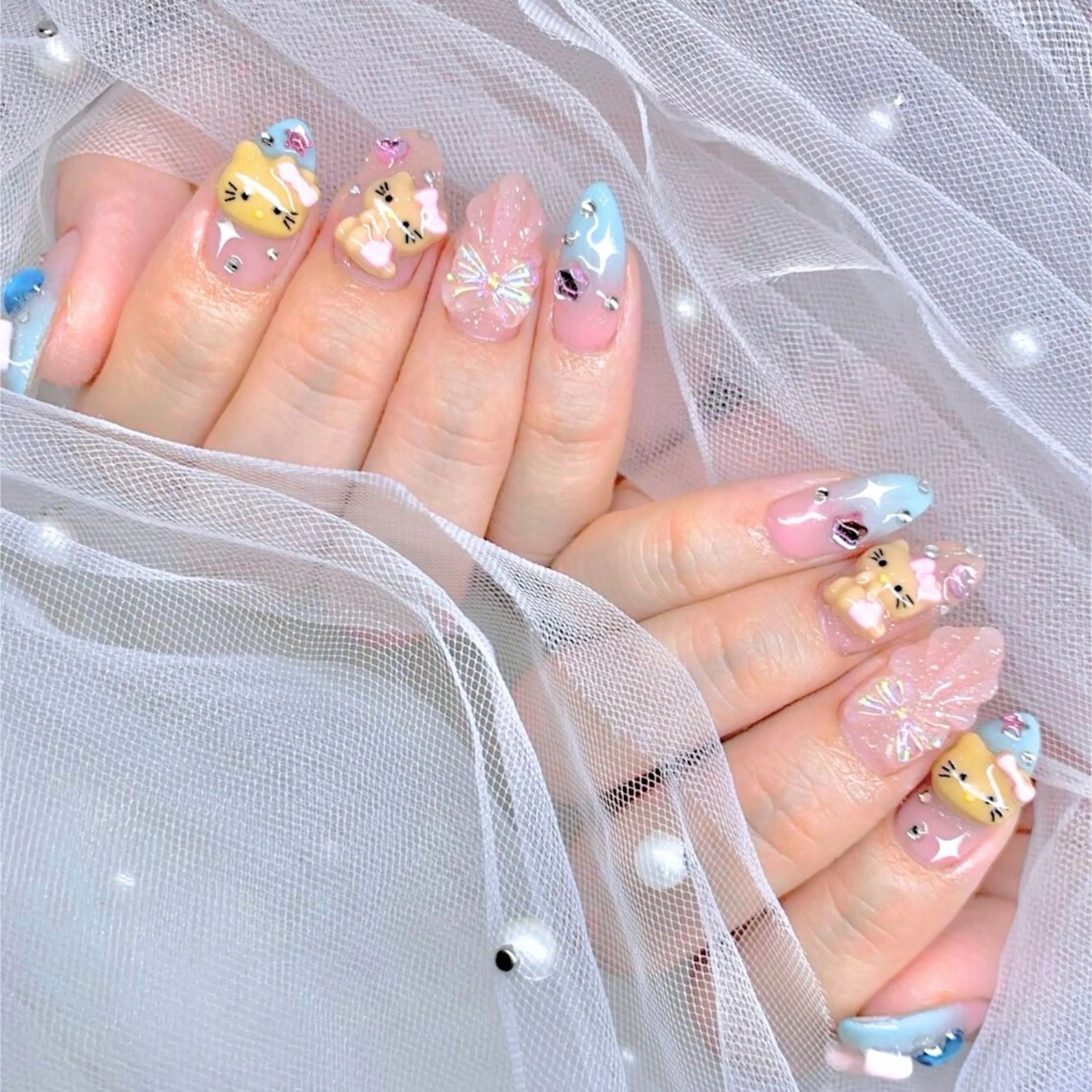 ネイル ハンドネイル TiTi Pomme Rinoのネイルデザイン