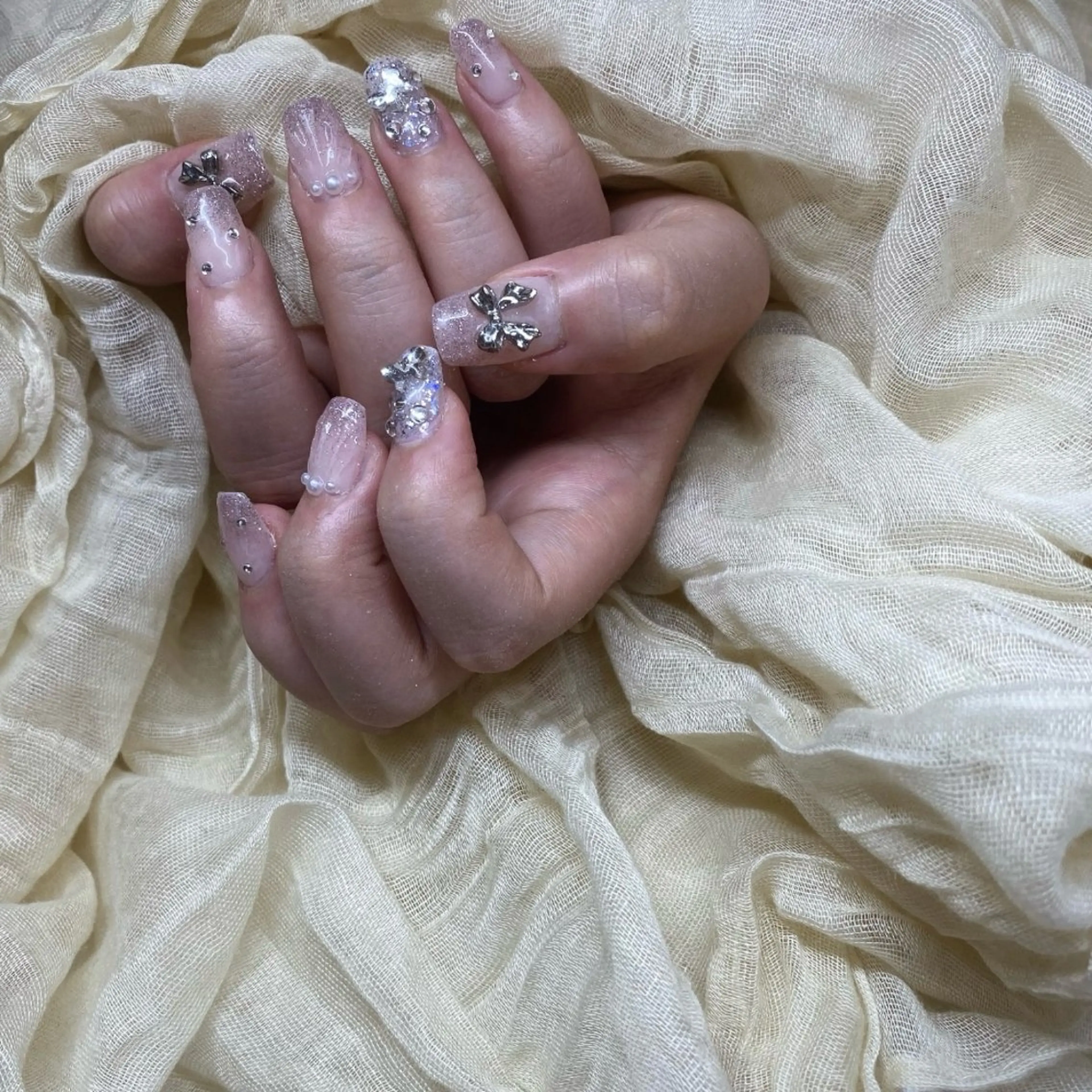 ネイル フラッシュネイル ガーリー グラデーション ピンク リボン nailsalon - Tino -のネイルデザイン