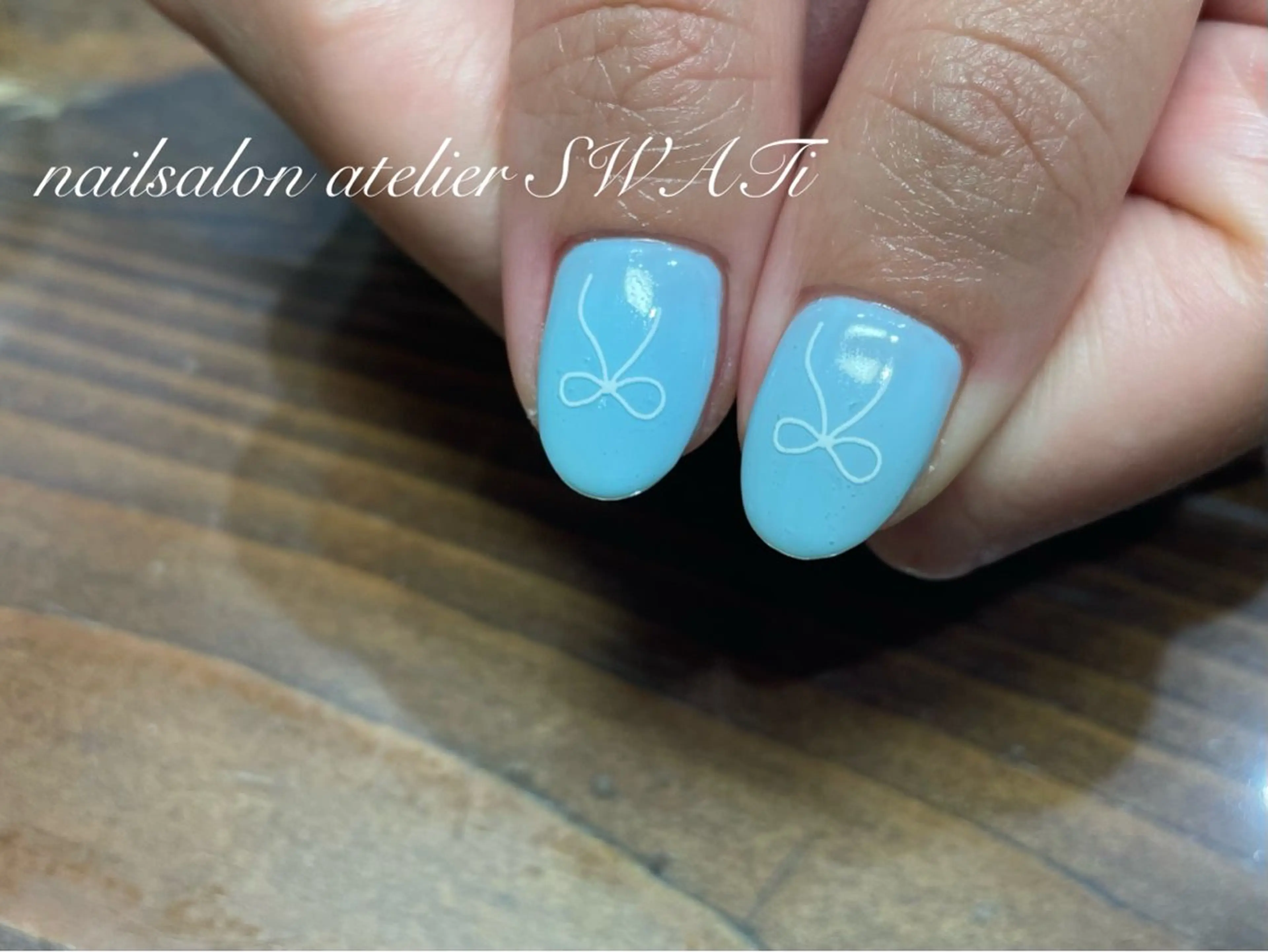 ネイル リボン ハンドネイル nailsalon SWATiのネイルデザイン