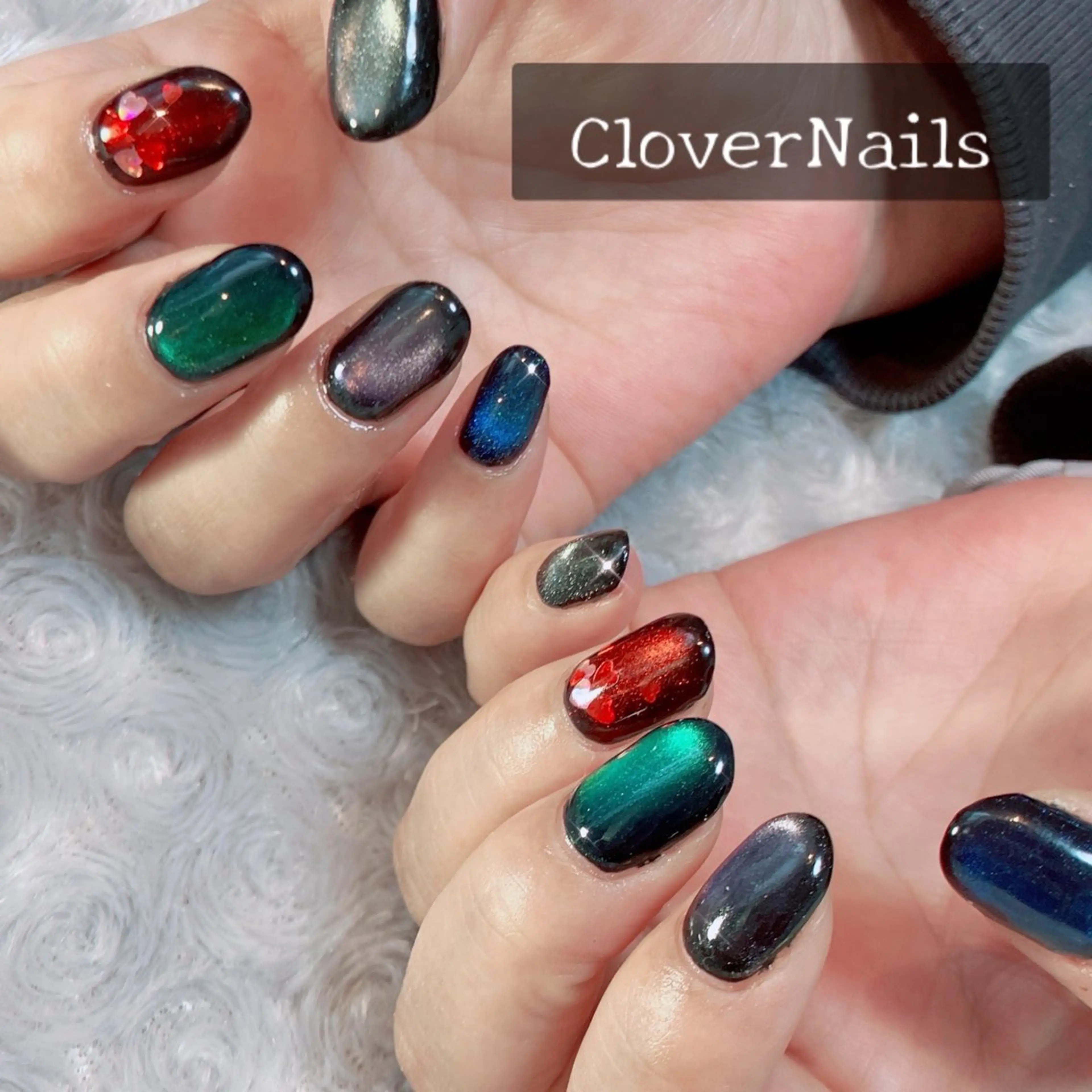 ネイル グリーン ハート キラキラネイル ラメ(グリッター) マグネットネイル ハンドネイル 自宅ネイルサロン クロバーネイルのネイルデザイン