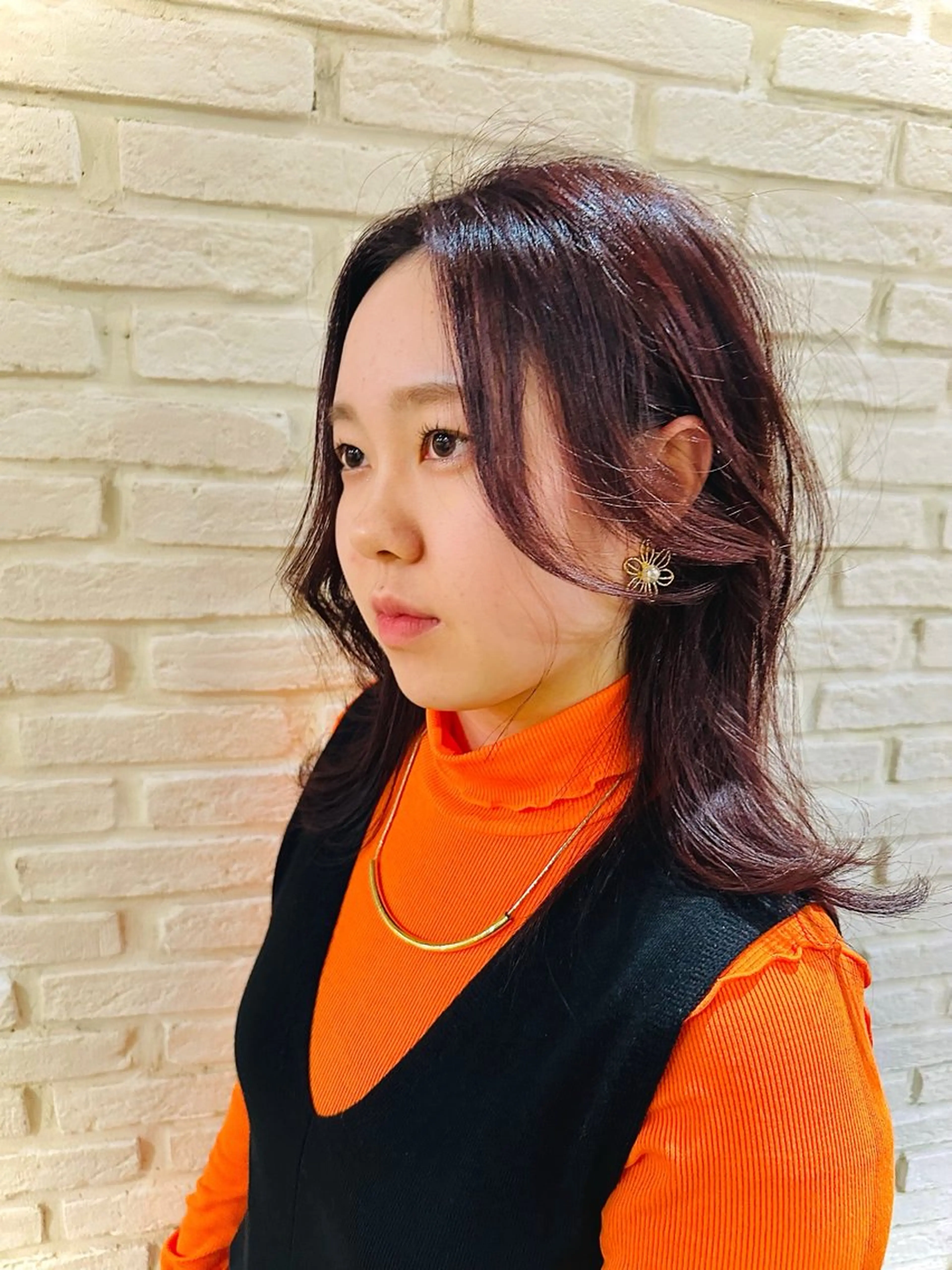 金 春江のヘアスタイル