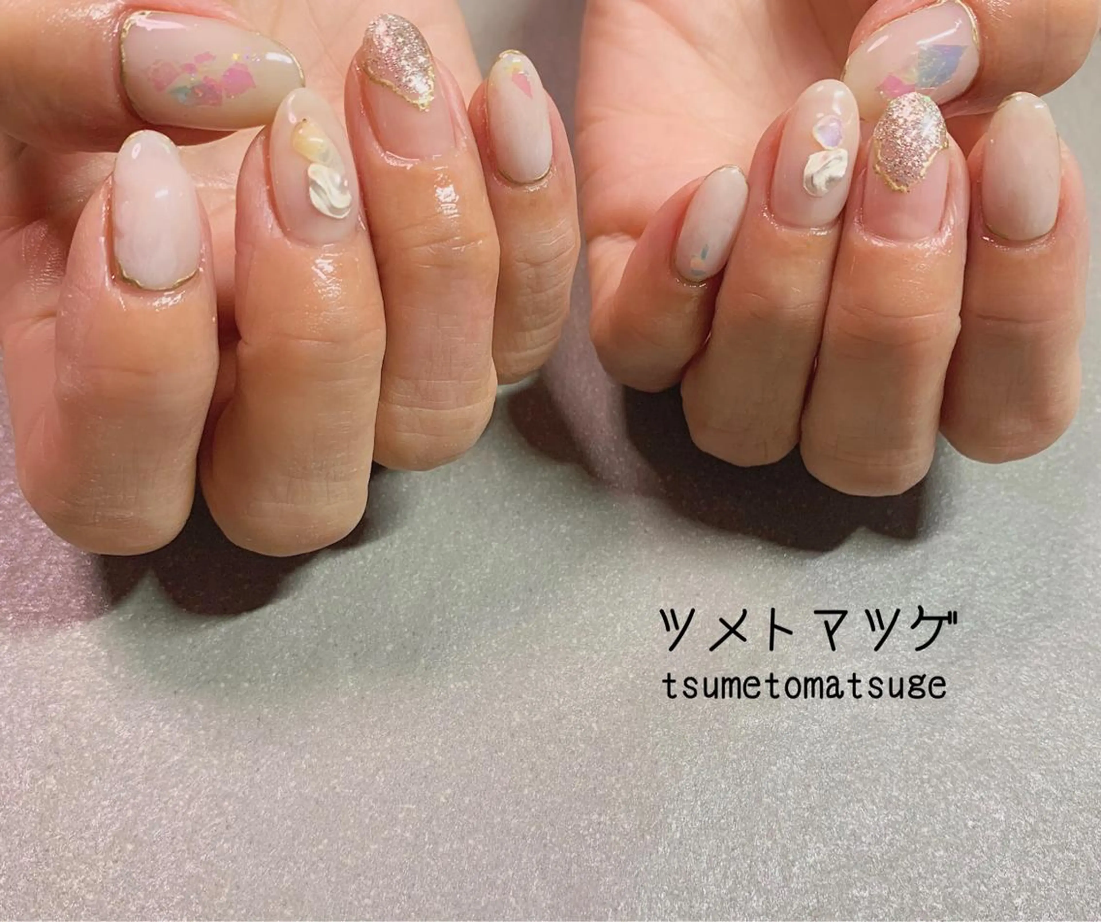 ミディアム ネイル アートネイル ハンドネイル ツメトマツゲ .のネイルデザイン