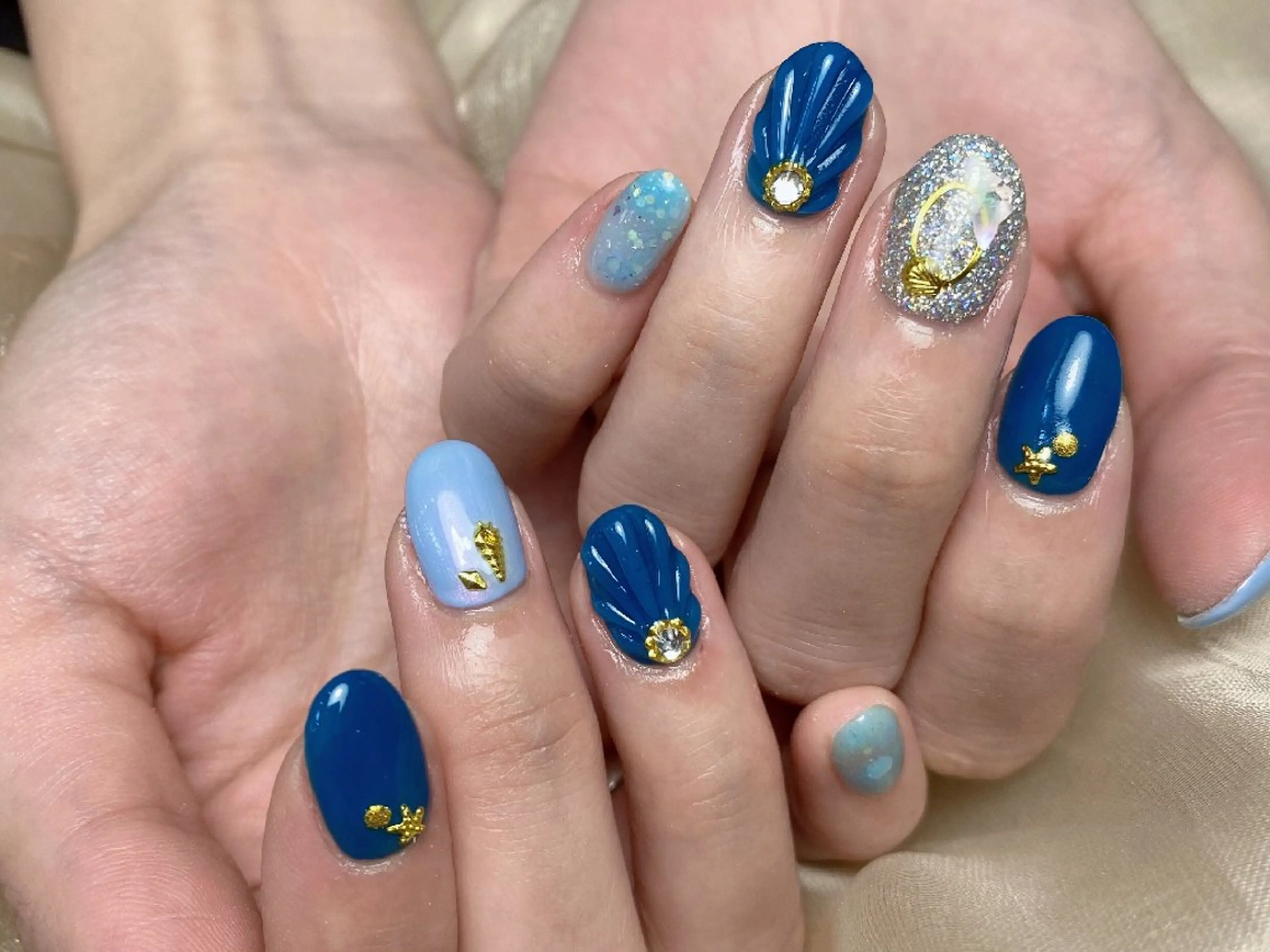 ネイル 水色 持ち込み 春ネイル ハンドネイル UM Nail Salonのネイルデザイン