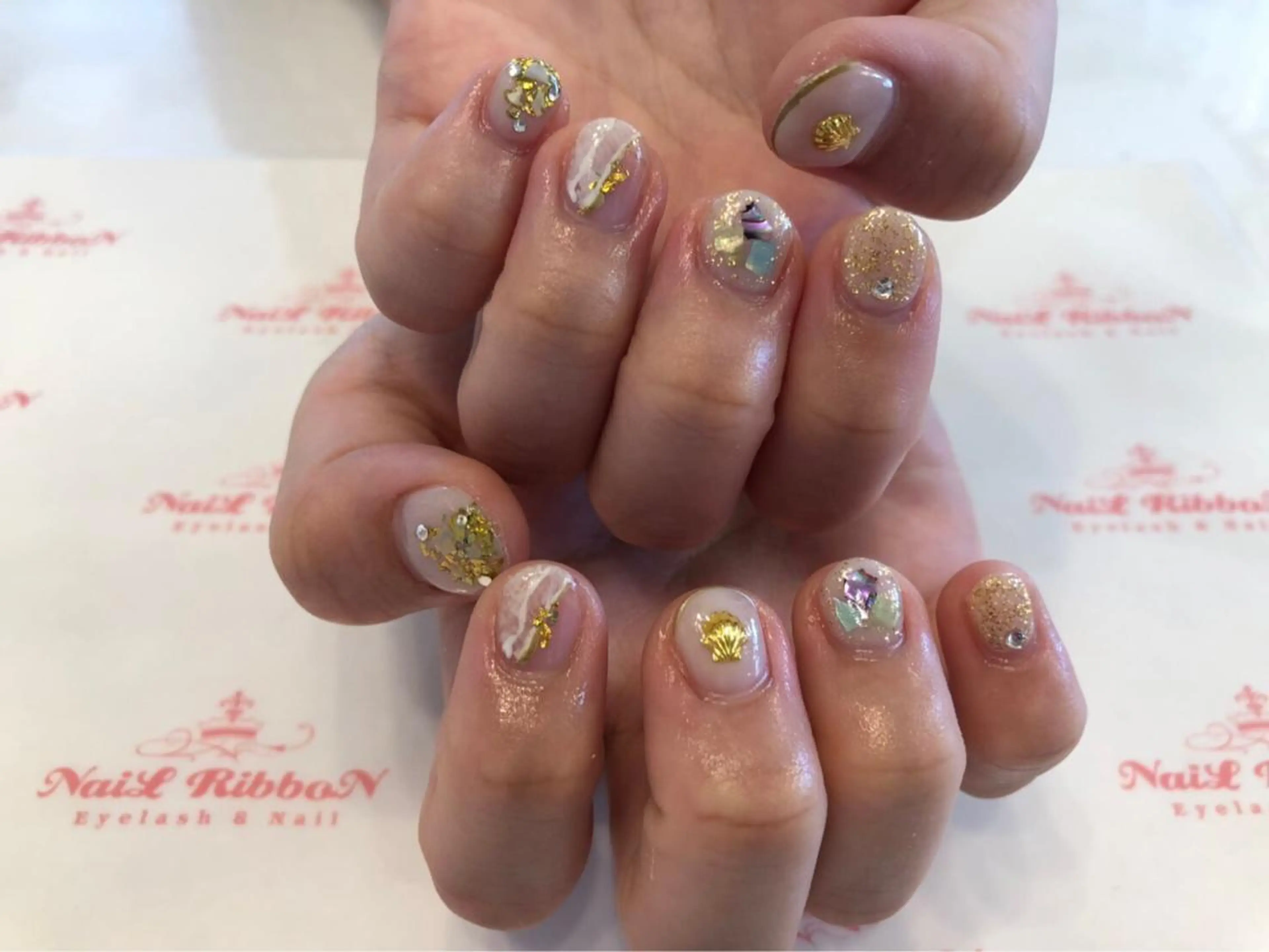 ネイル 春ネイル ネイルリボン 受付スタッフのネイルデザイン