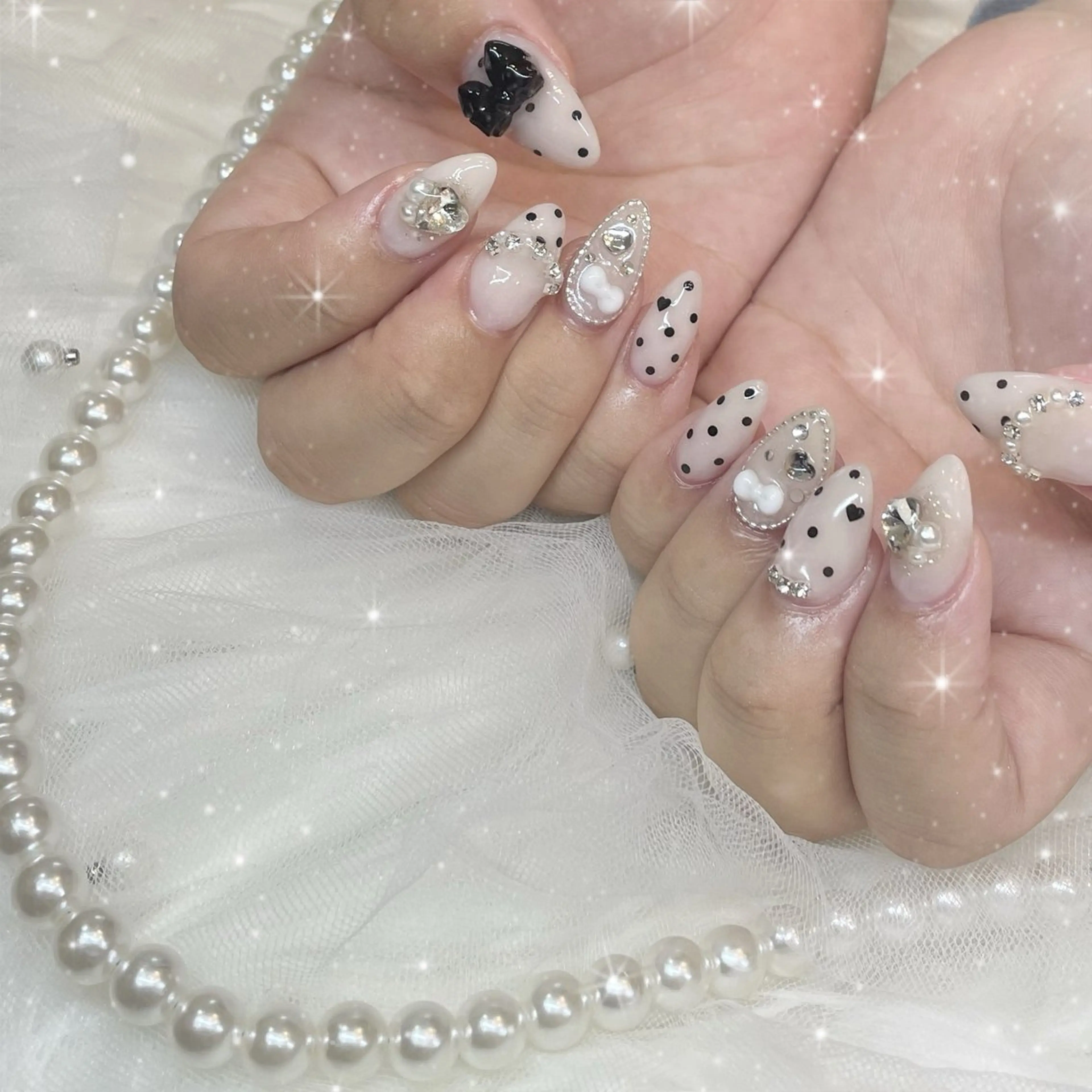 ネイル ドット リボン Blue daisy RIN🎀のネイルデザイン
