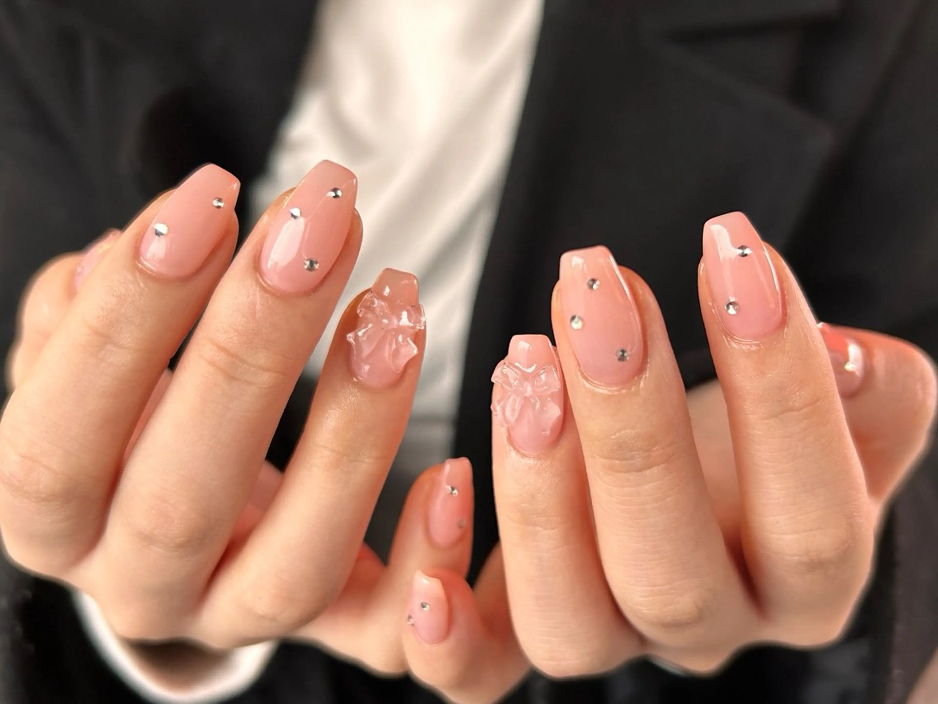 ネイル ガーリー ワンカラーネイル ピンク リボン ハンドネイル MILE. mukonosouのネイルデザイン